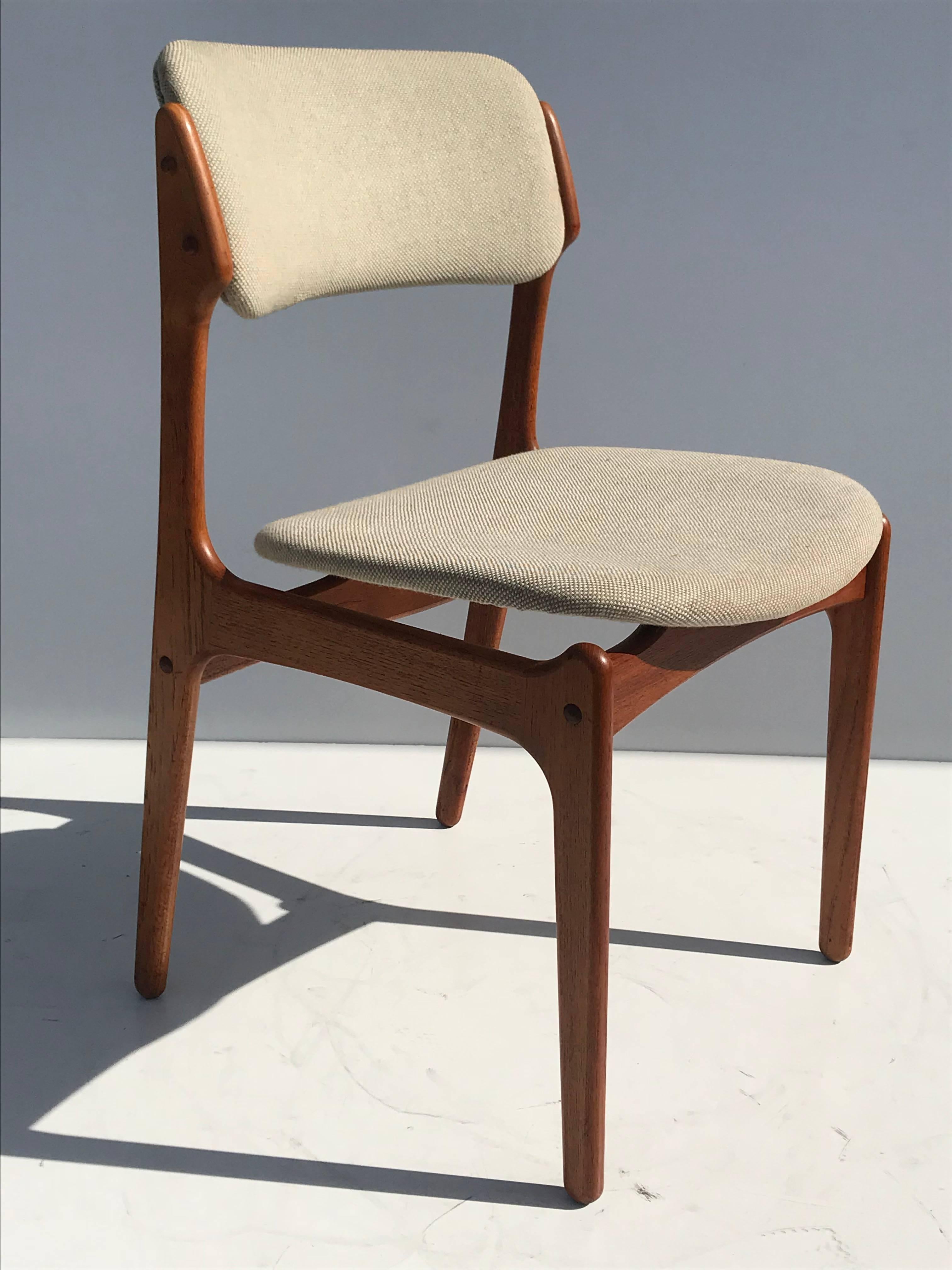 Set of four Danish modern Erik Buch teak chairs . Reupholstery recommended.