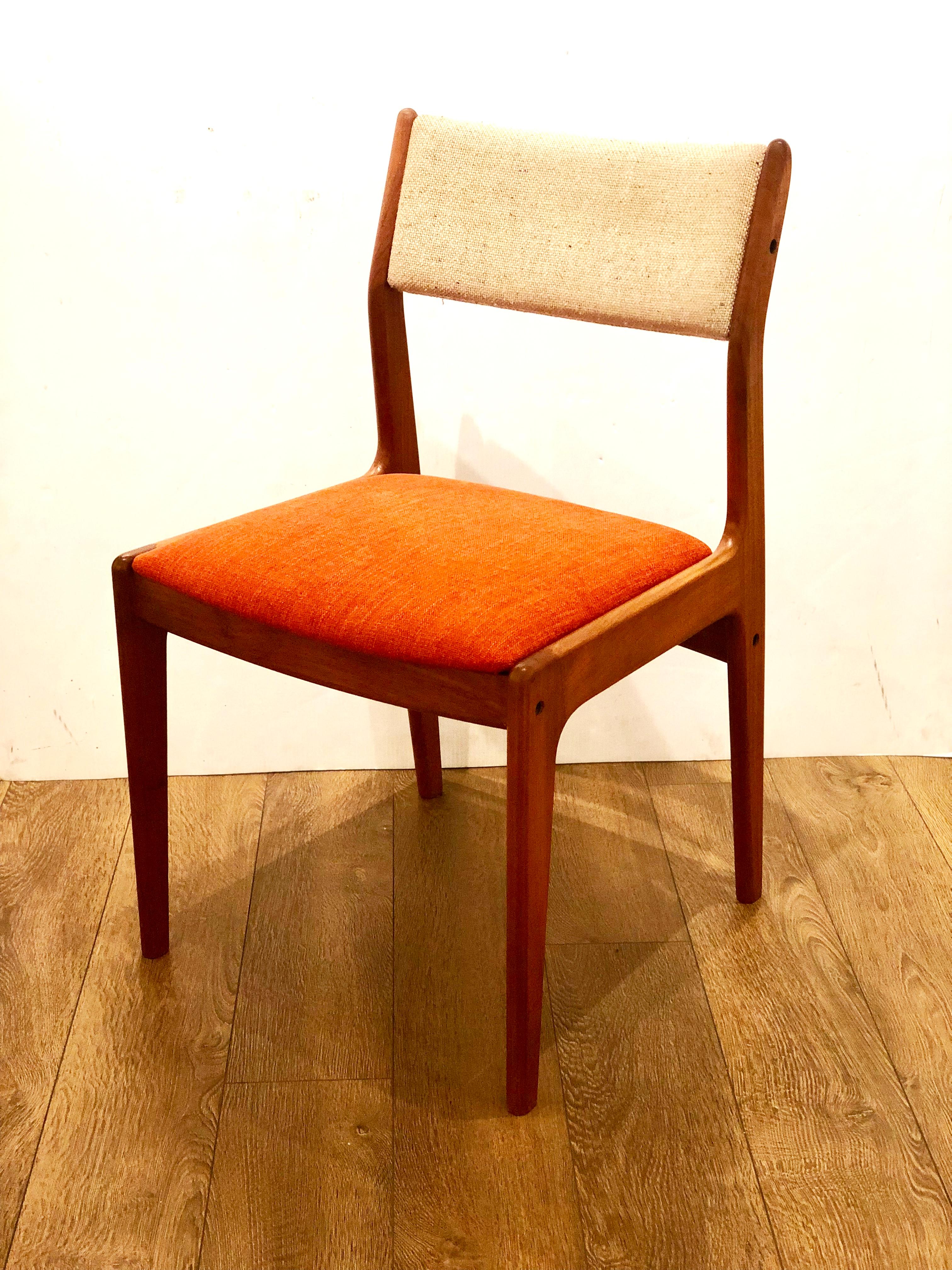 Nice solid teak set of four dining chairs, freshly recover seats with orange fabric, and original oatmeal color back rest, circa 1970s, well construction nice dovetail detail junctions.