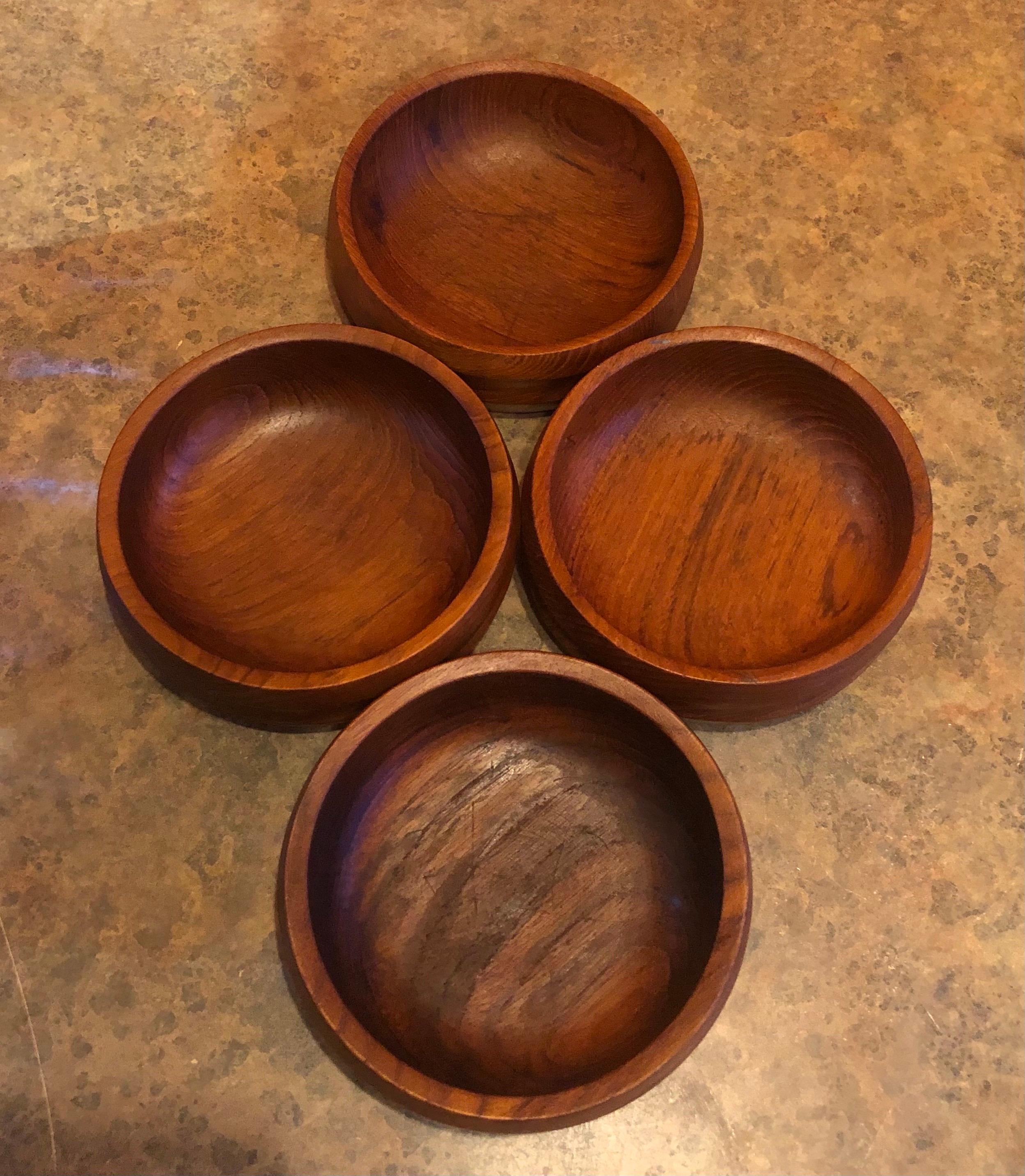 A very nice set of four Danish modern staved teak salad bowl by Jens Quistgaard for Dansk, circa 1960s. The bowls measure 5.75