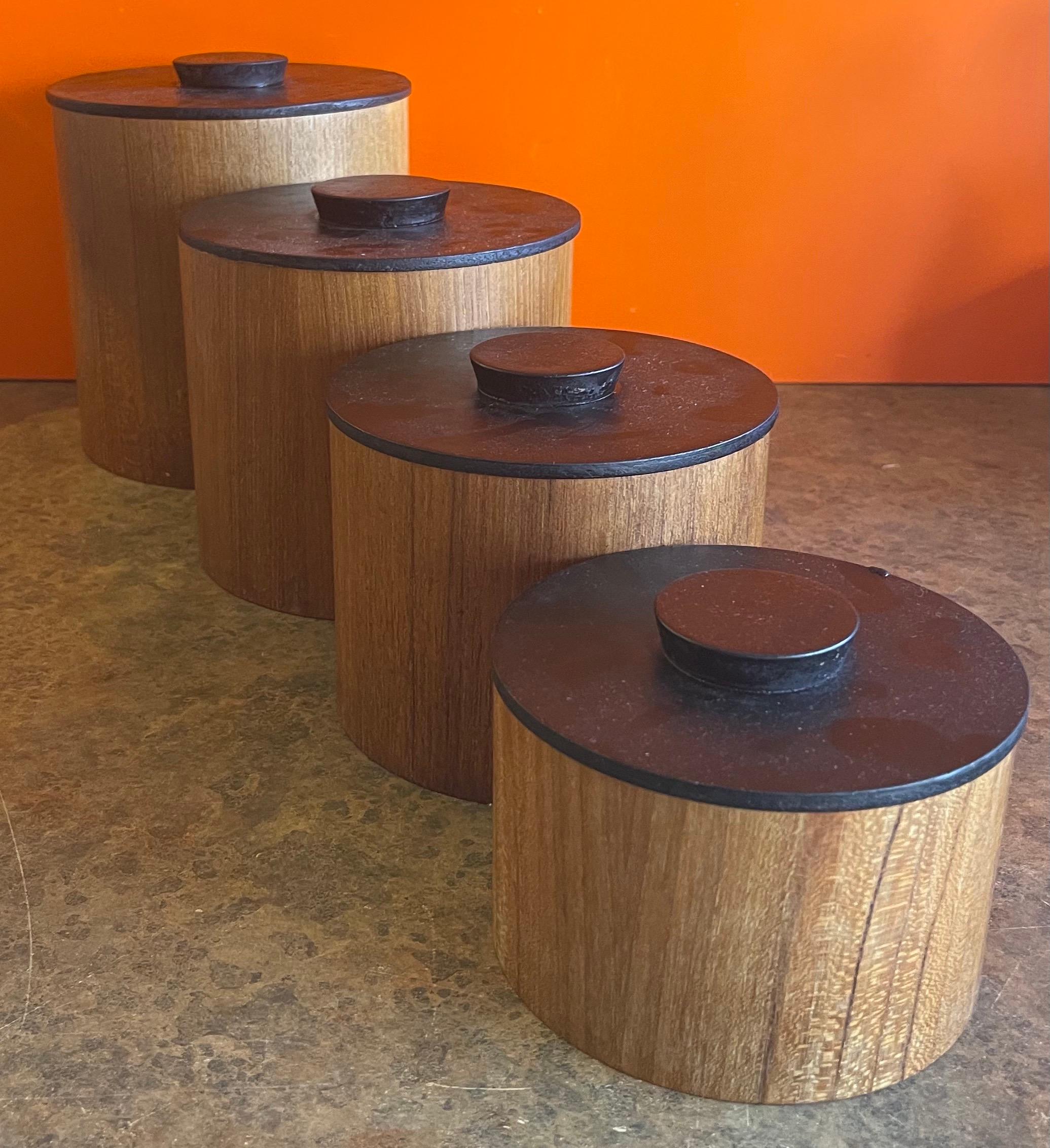 Mid-Century Modern Set of Four Danish Modern Teak Stackable Storage Cannisters For Sale