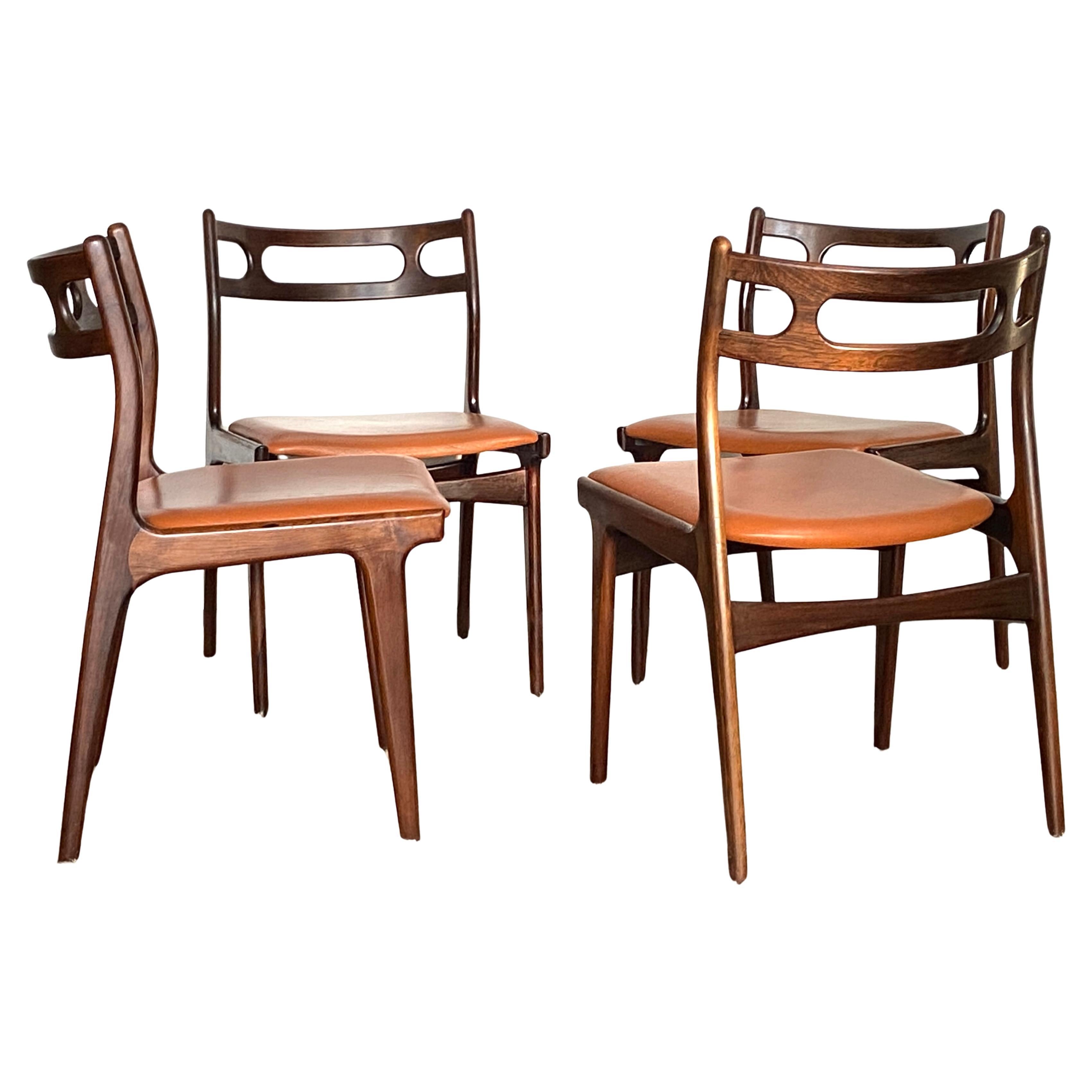 Set of four Danish rosewood model 138 dining chairs by Johannes Andersen For Sale