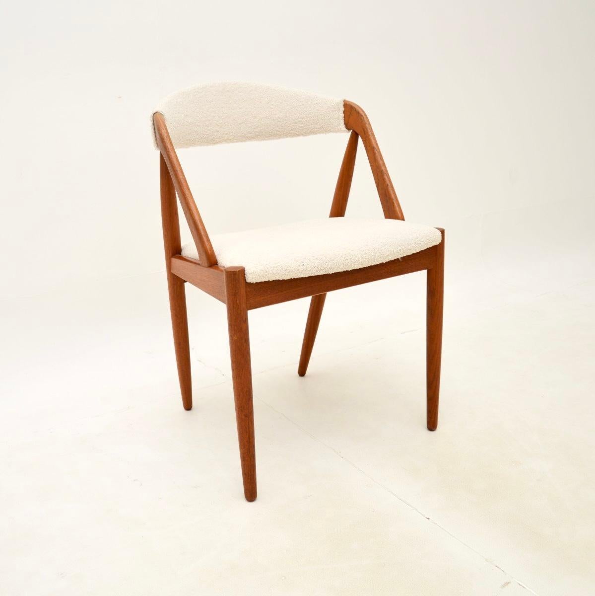 Mid-Century Modern Set of Four Danish Teak Model 31 Dining Chairs by Kai Kristiansen For Sale