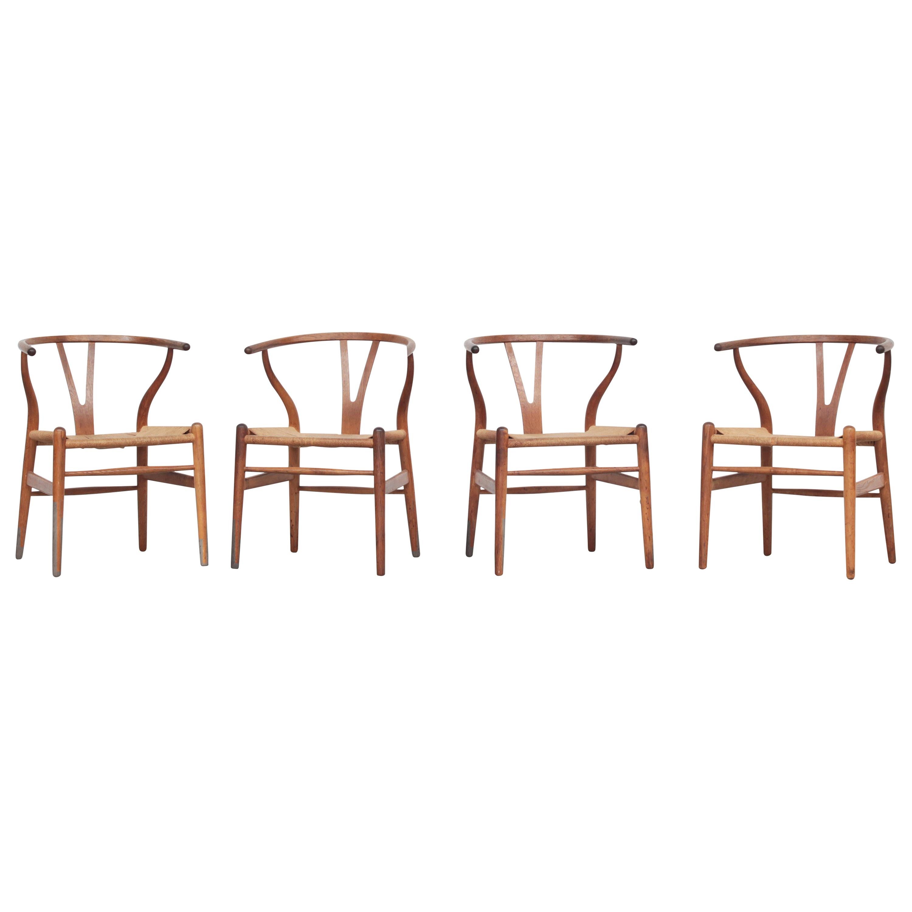Set of Four Danish Wishbone Chairs CH 24 by Hans J. Wegner for Carl Hansen Oak