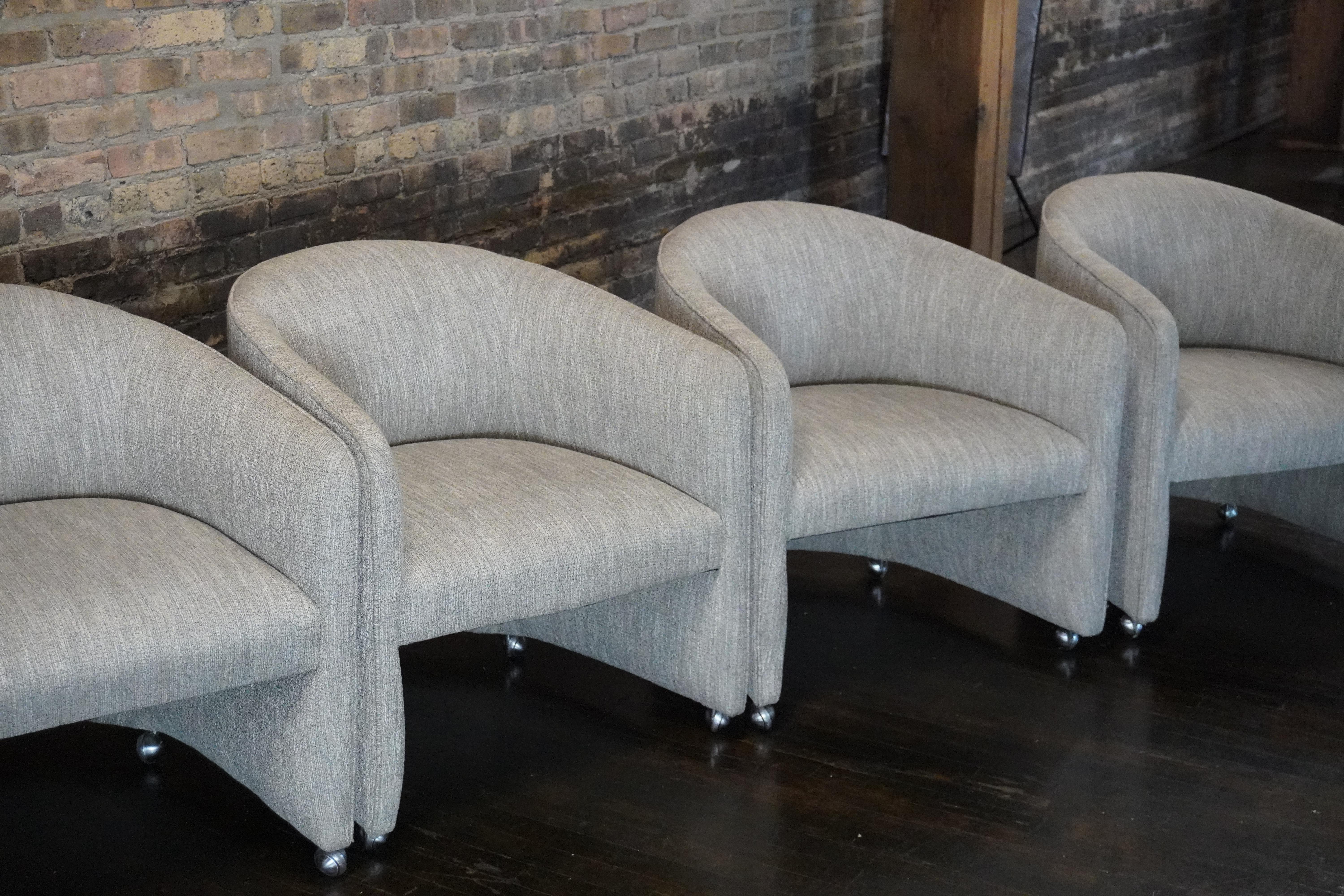 American Set of Four Designer Mid-Century Upholstered Barrel Back DiningChairs on Castors For Sale