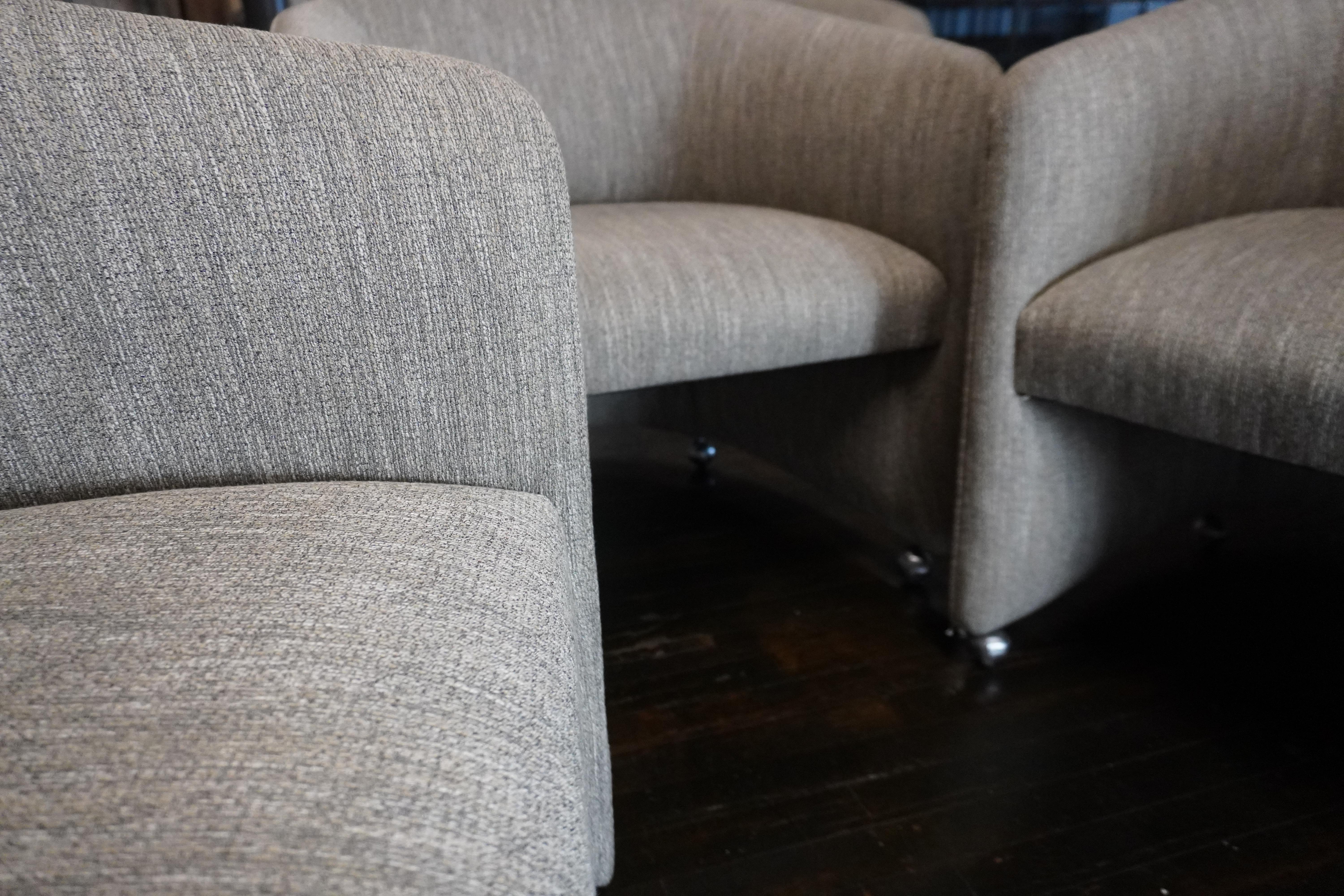Upholstery Set of Four Designer Mid-Century Upholstered Barrel Back DiningChairs on Castors For Sale