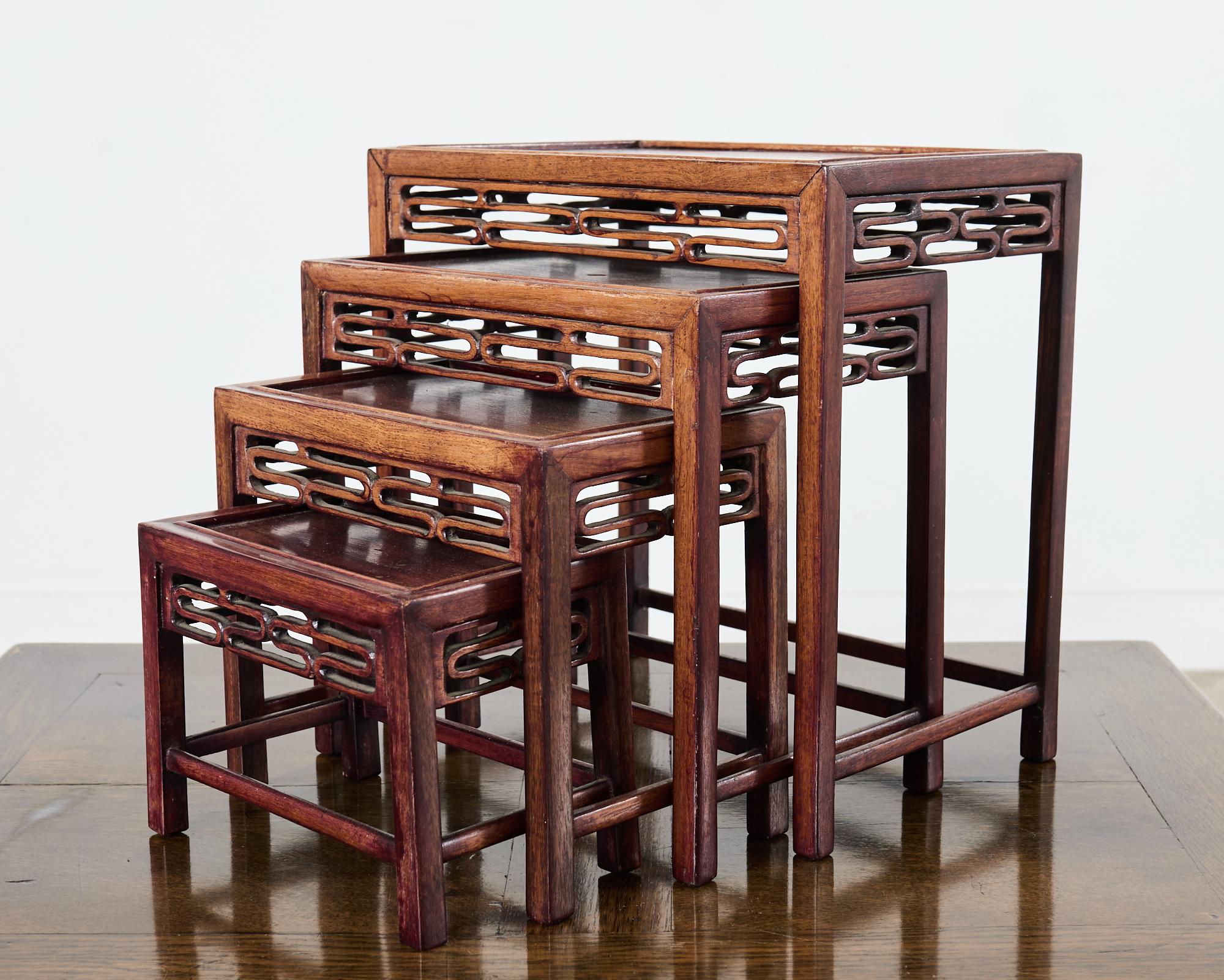 Hand-Crafted Set of Four Diminutive Chinese Export Hardwood Nesting Tables For Sale