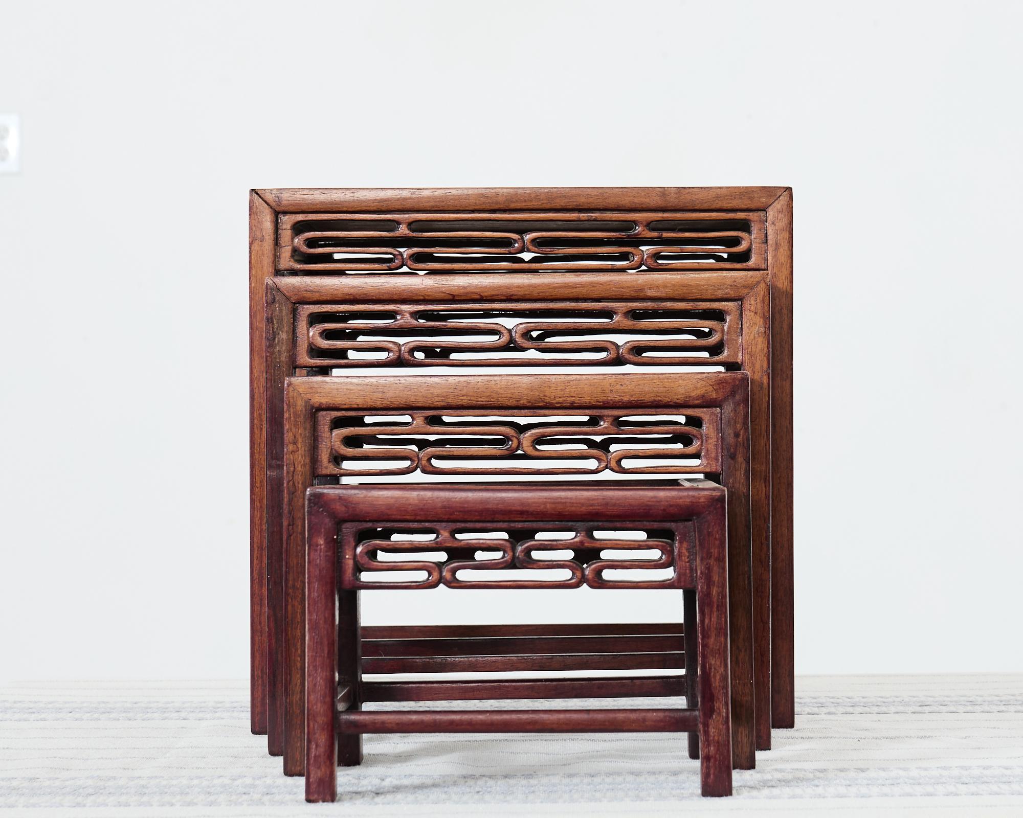 20th Century Set of Four Diminutive Chinese Export Hardwood Nesting Tables For Sale