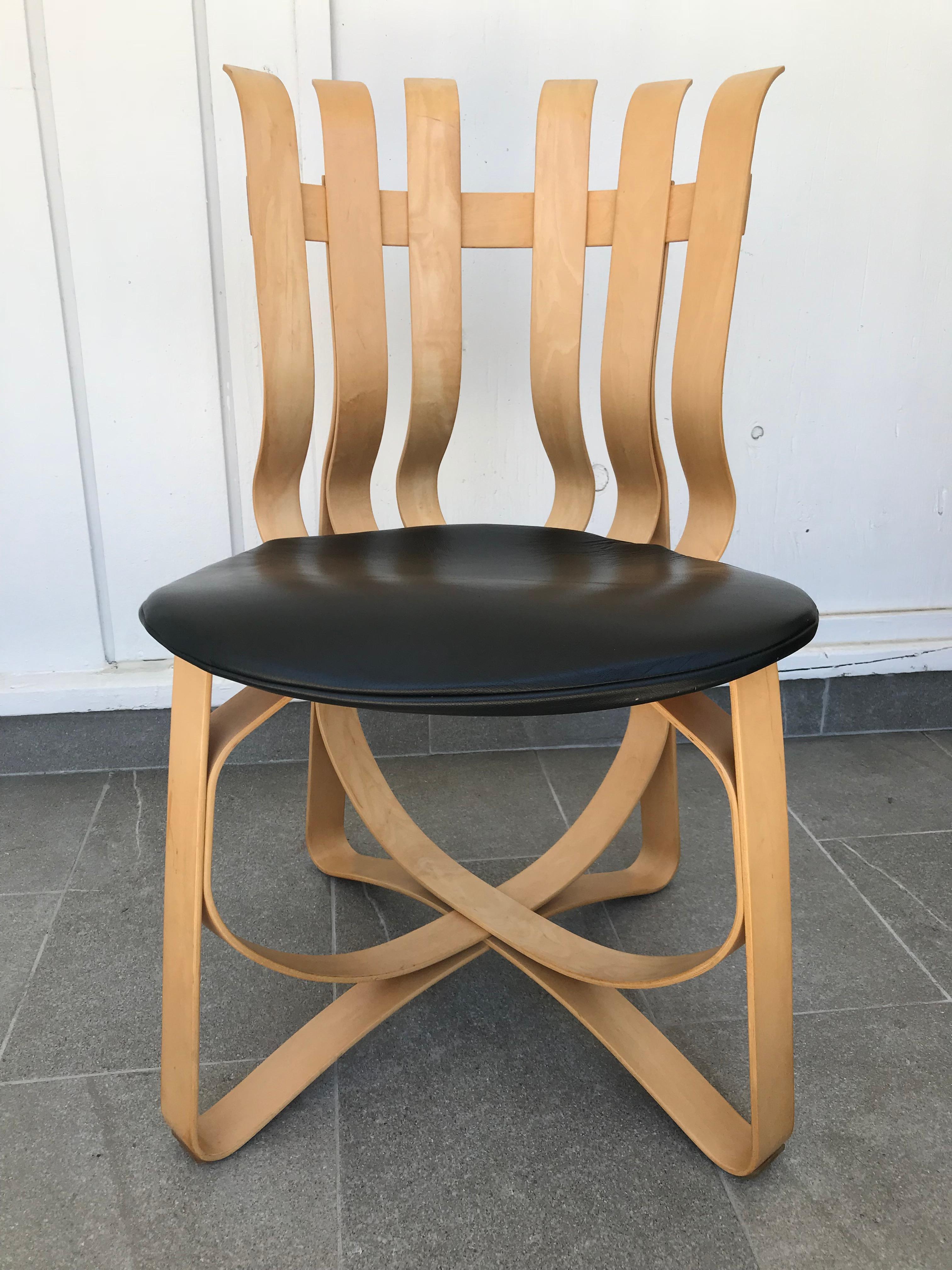 Only the famous architect Frank Gehry could dare to build a chair with slender strips of maple with such an innovative design!
He named them the hat trick chairs and that has been a really good hat-trick!
They look so beautiful and precious that