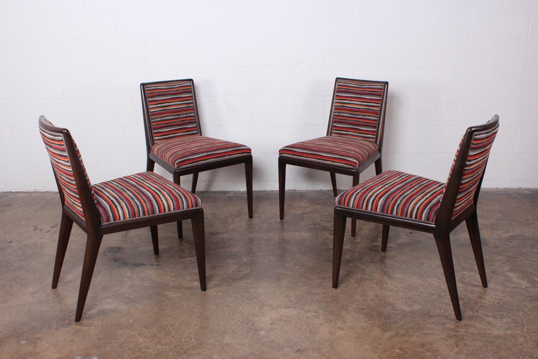 A set of four dining chairs designed by T.H. Robsjohn-Gibbings for Widdicomb.