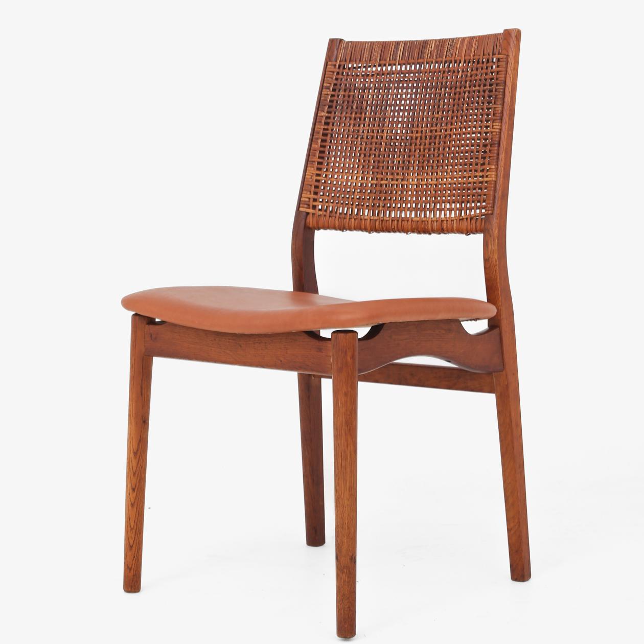 Set of four chairs in oak, cane and cognac leather. Helge Sibast