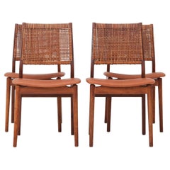 Set of four dining chairs by Helge Sibast