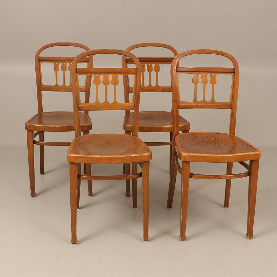 Beech bentwood with embossed plywood seat and with three tulips decorated back rest. Made in Austria in the 1900s by Jacob & Josef Kohn. Set of four.
