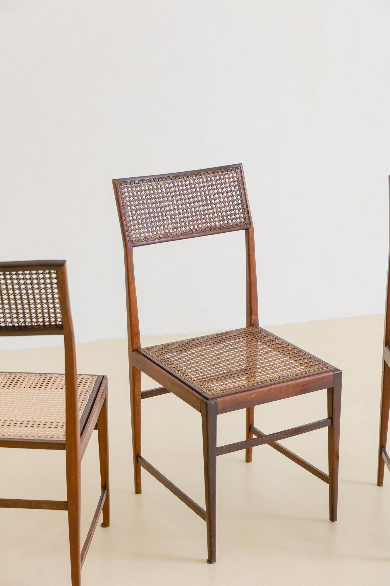 Mid-Century Modern Set of Four Dining Chairs by Joaquim Tenreiro, Rosewood and Cane, circa 1960 For Sale