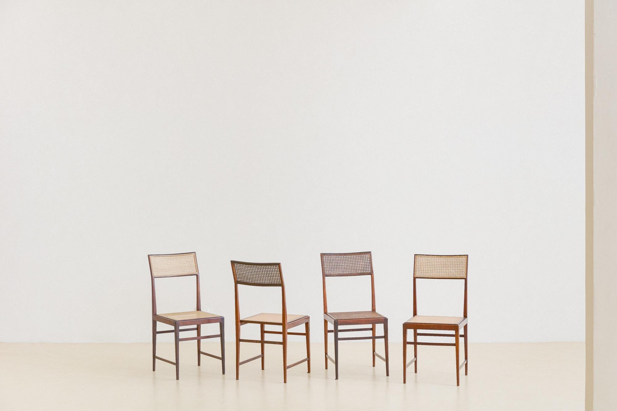 Brazilian Set of Four Dining Chairs by Joaquim Tenreiro, Rosewood and Cane, circa 1960 For Sale