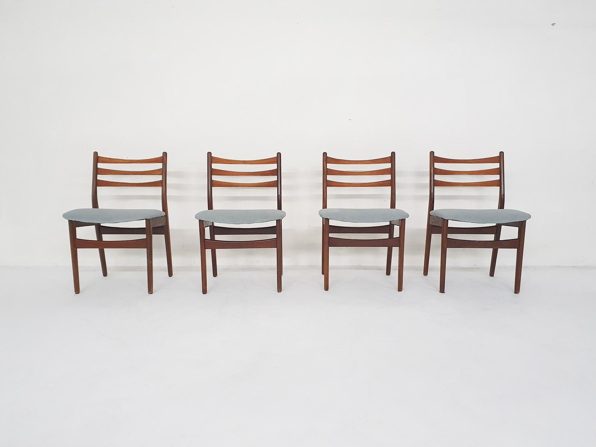 Teak dining chairs with light blue upholstery.

Wood has been refinshed and joints have been checked and glued
