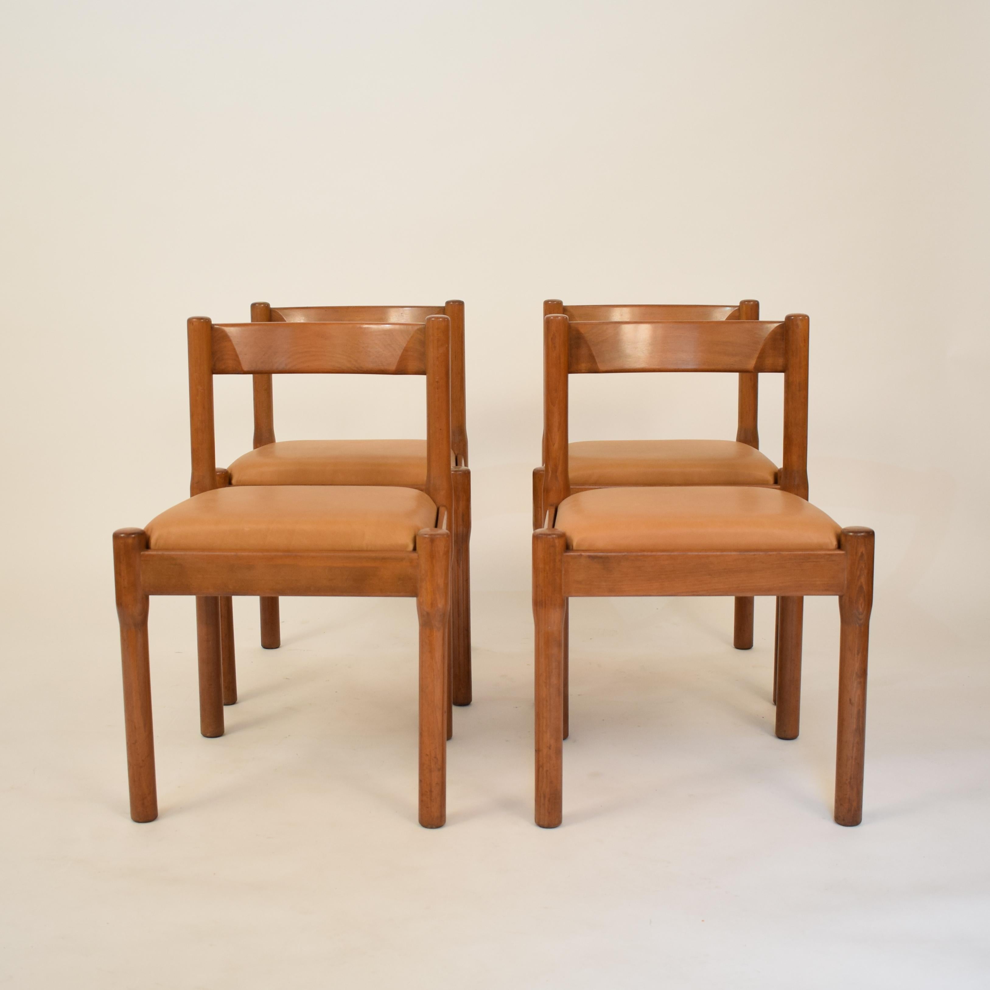 This beautiful set of four Mid Century dining chairs by Vico Magistretti where produced by Cassina (each chair is stamped) around 1960.
The Model is called Carimate and they are made out of beech. The upholstery got redone in very smooth light brown