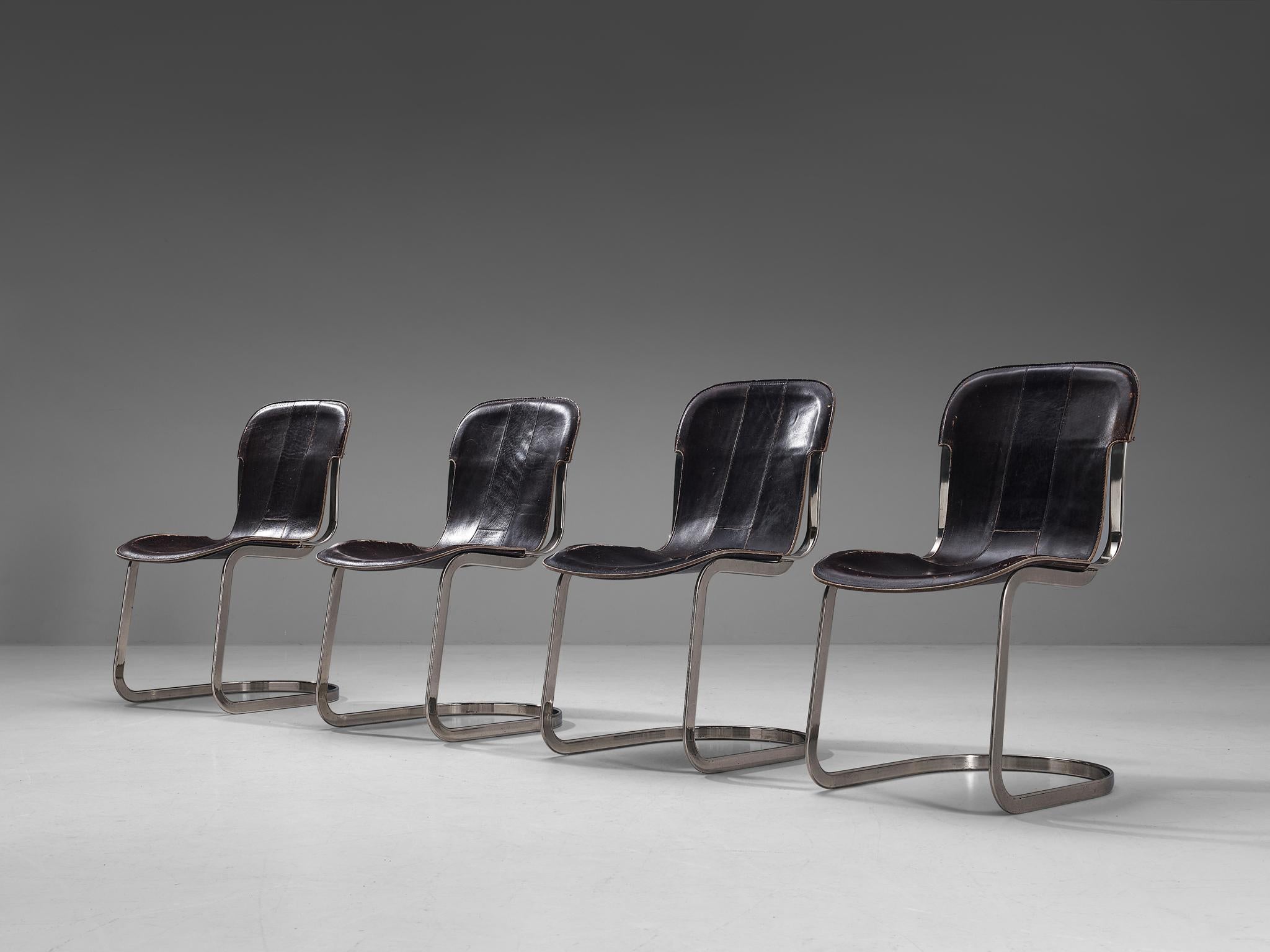Cidue, set of four chairs, chrome, leather, Italy 1970s.

Cantilevered dining room chairs with chromed flat tubular steel frame. The seating and back are from thick dark brown colored saddle leather. The leather shows a nice all-over patina, which