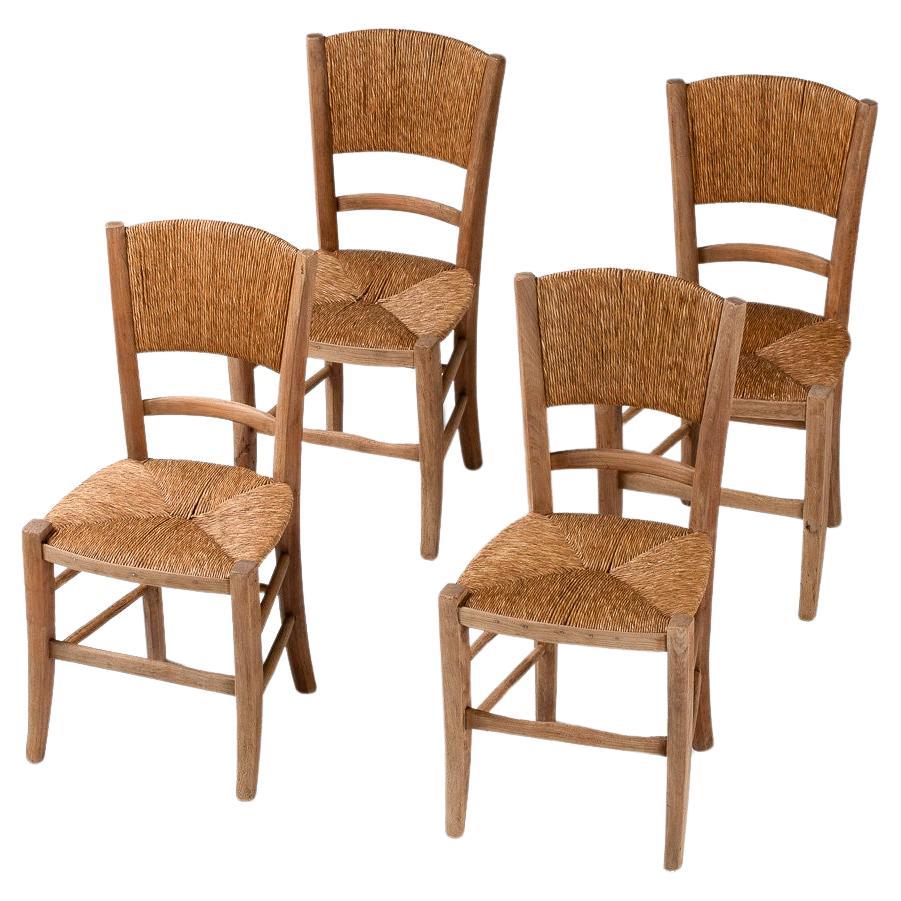Set of Four Dining Chairs in Oak and Rush, France, 1950s For Sale