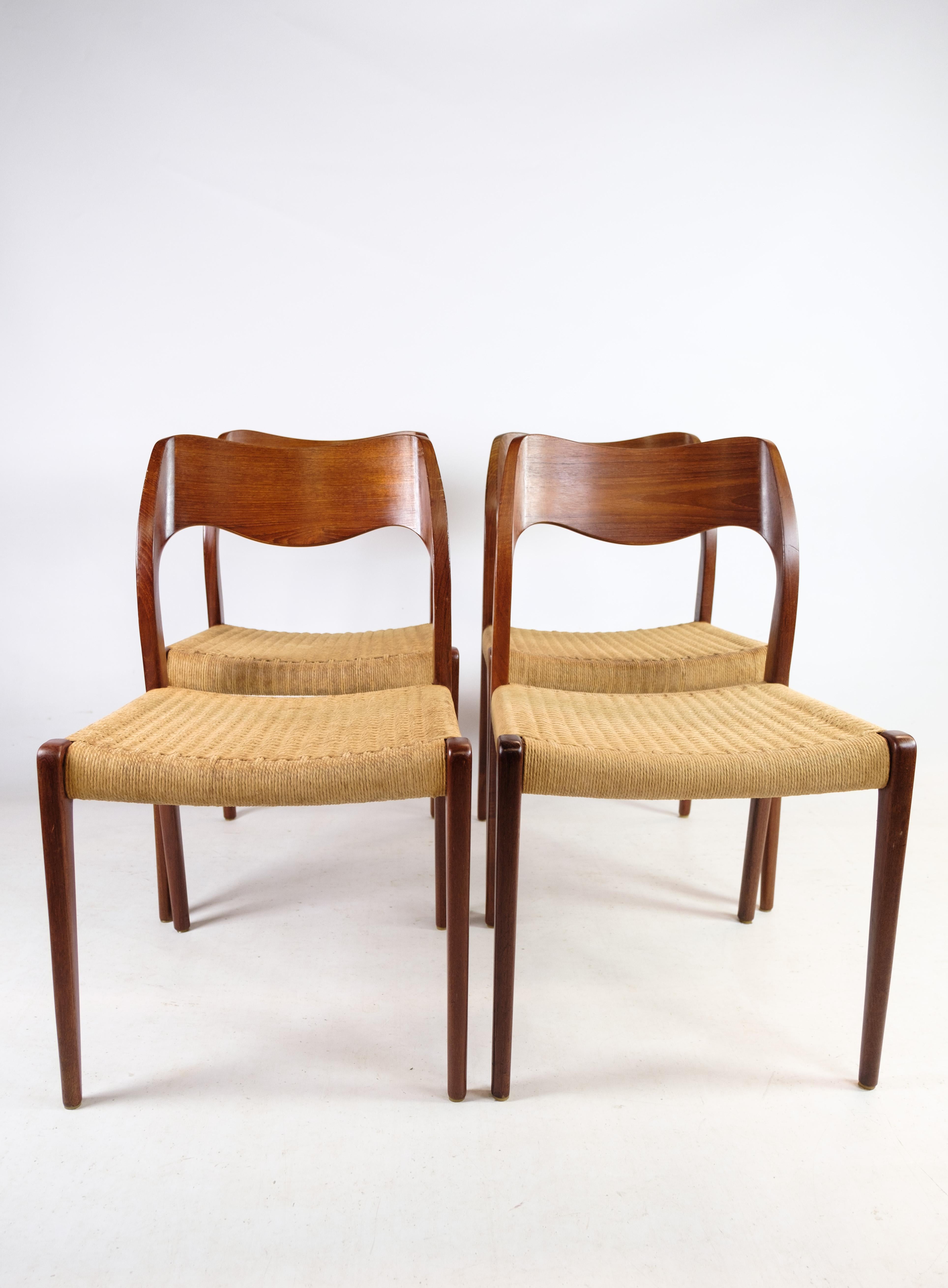 Set of 4 dining room chairs, model 71, designed by N.O Møller designed in 1951. Stands with very fine teak frame and wicker seat. Produced by J.L. Møllers Møbelfabrik.
Dimensions in cm: H: 77.5 W: 50 D: 42 SH: 45
This product will be inspected