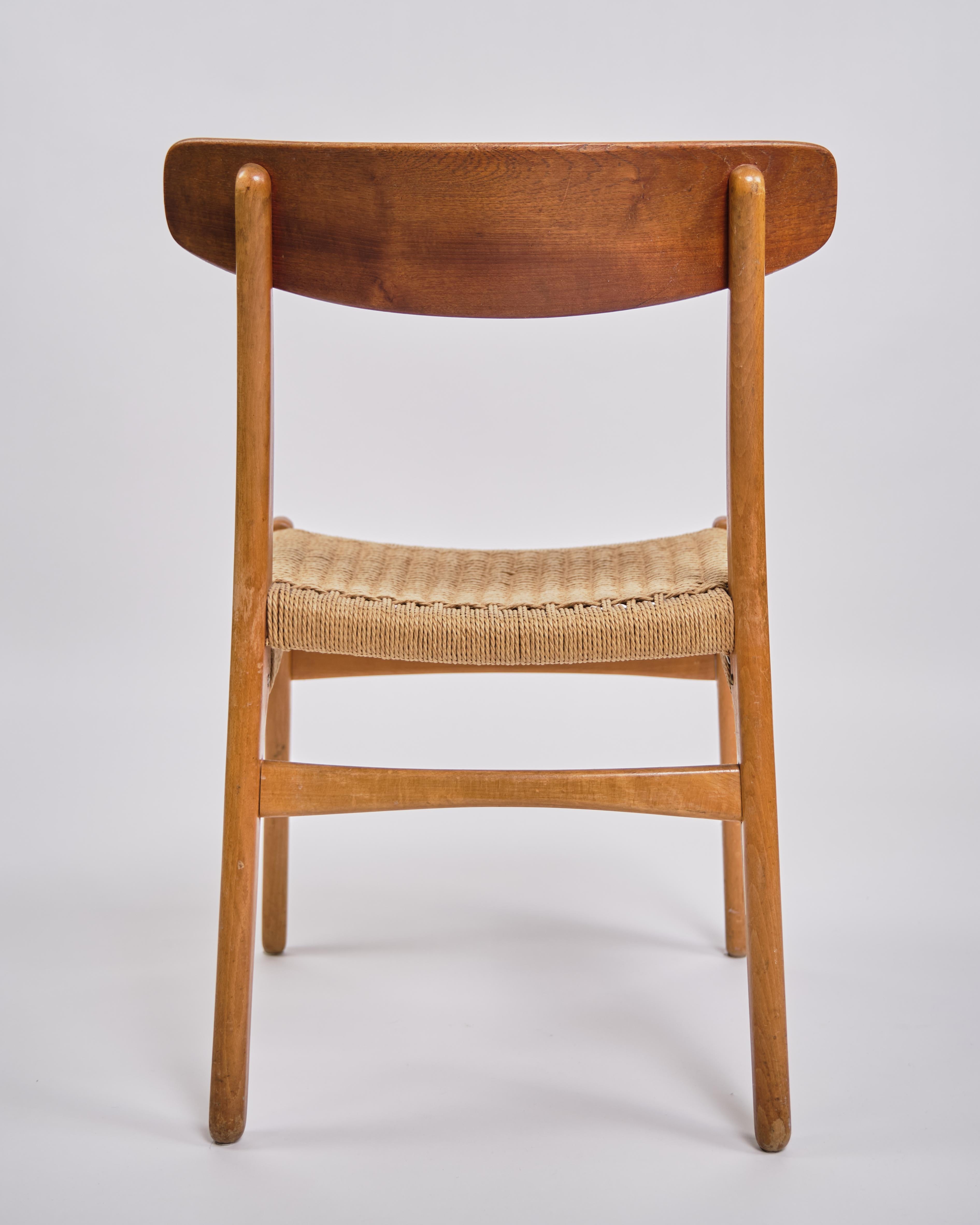 Teck Ensemble de quatre chaises de salle à manger Model No. CH23 en teck par Hans J. Wegner des années 1960