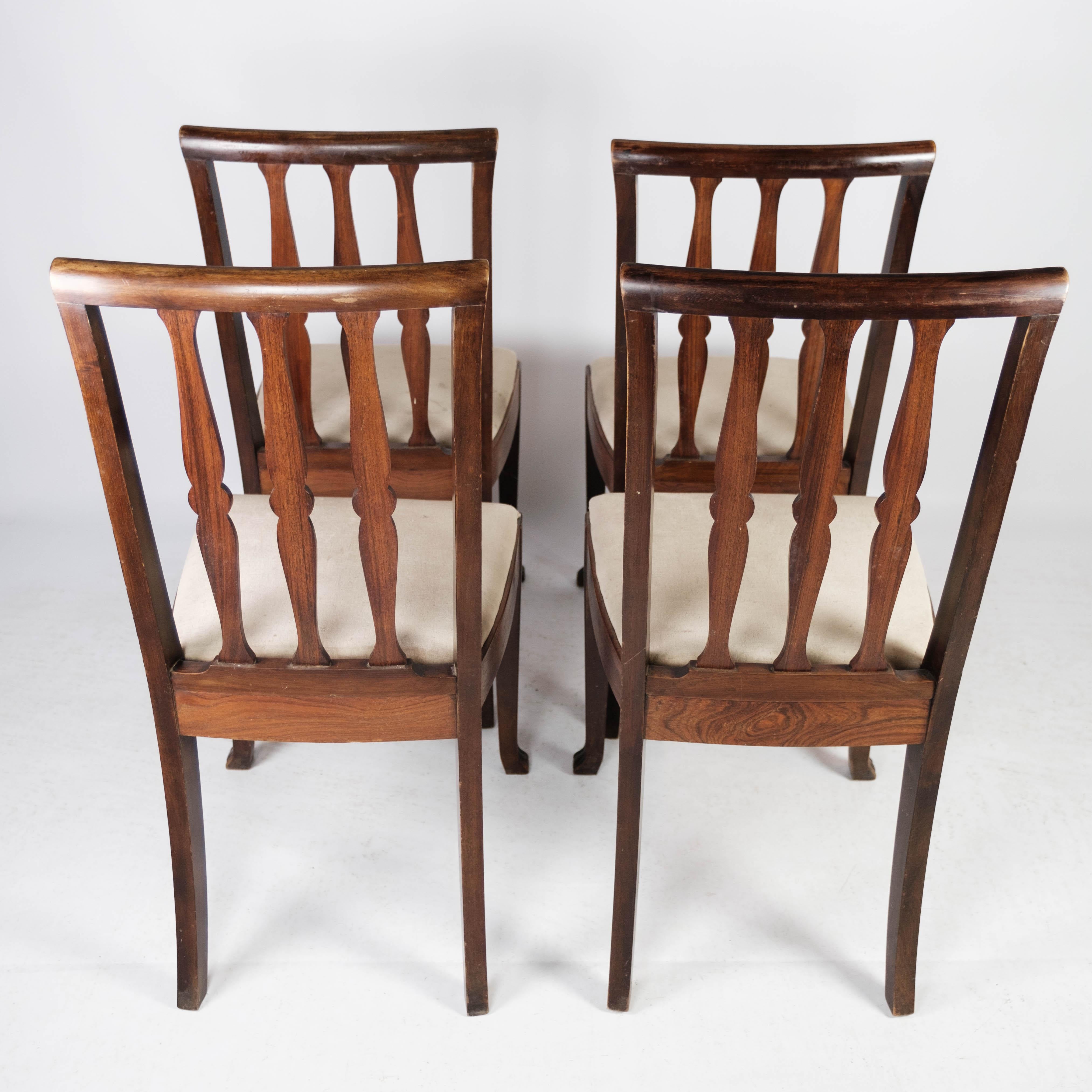 Set aus vier Esszimmerstühlen aus Palisanderholz, 1920er Jahre (Stoff) im Angebot