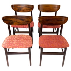 Ensemble de quatre chaises de salle à manger en bois de rose, design danois, années 1960