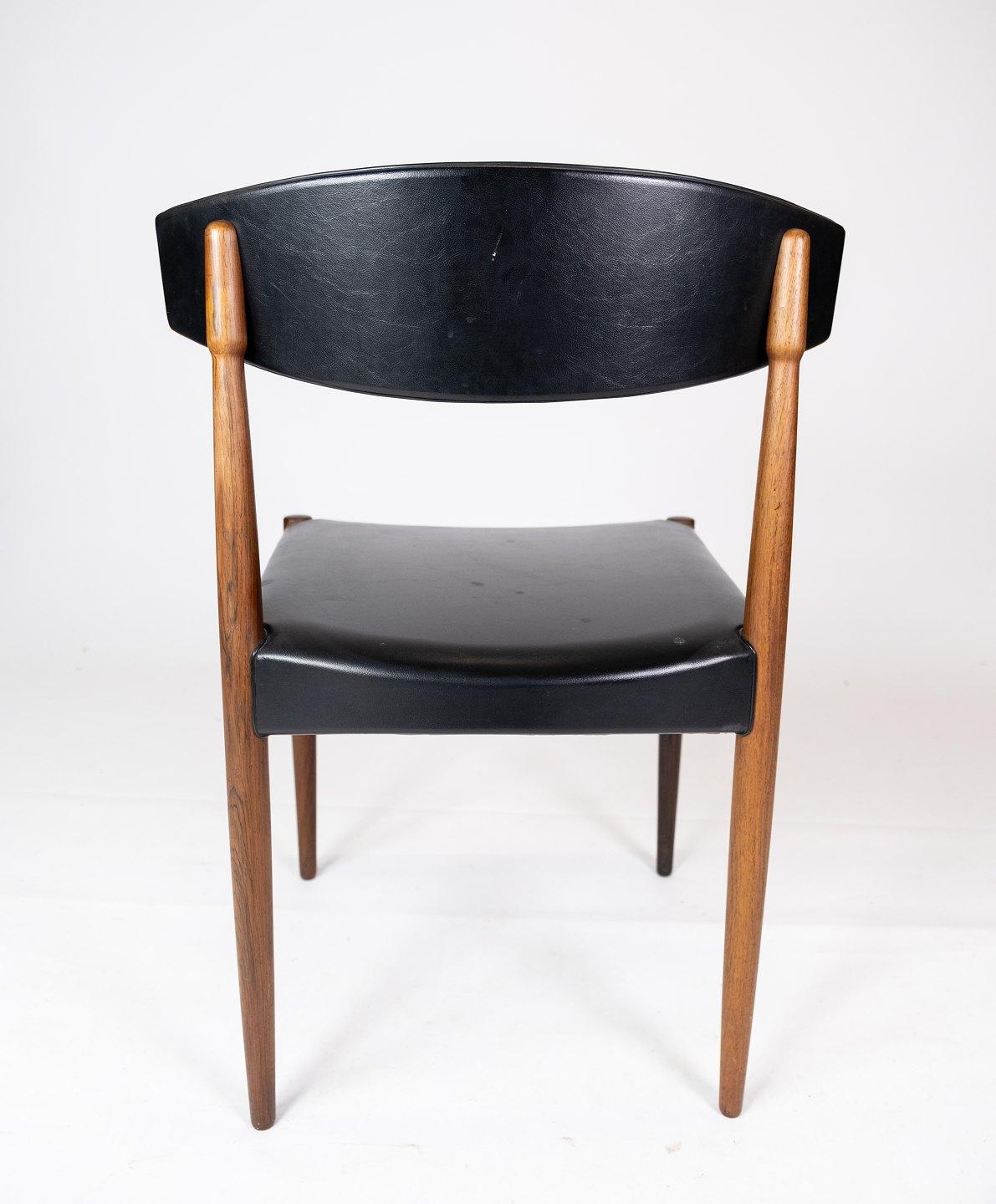 Milieu du XXe siècle Ensemble de quatre chaises de salle à manger en bois de rose des années 1960 en vente