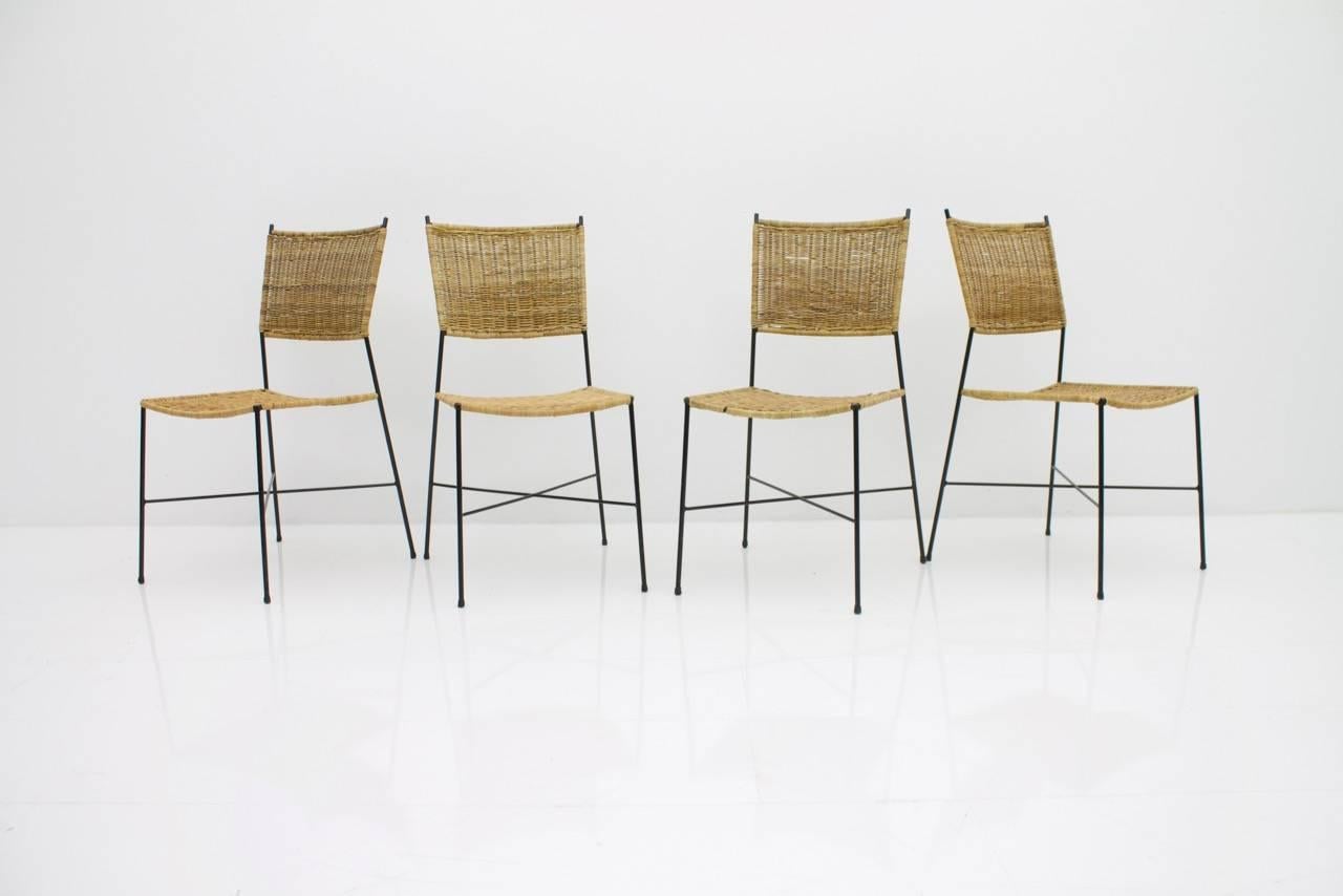 Set of four dining room chairs in wicker and metal, Germany, 1960s.
Good condition with small signs of usage.