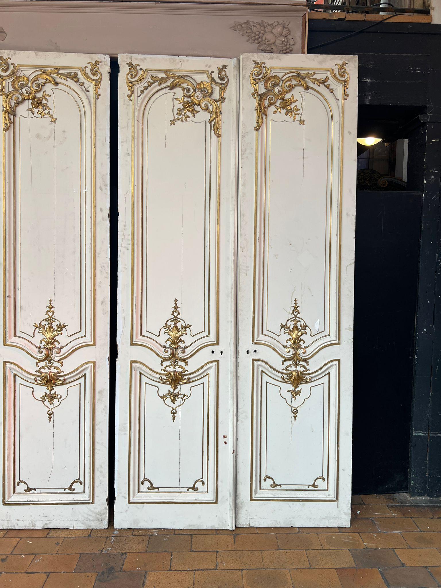 Set of Four Double Louis XVI Style Doors, Early 20th Century

This magnificent set of four double doors captures the refined elegance of the Louis XVI style, with exquisite neoclassical ornamentation and gilded detailing. Each panel features
