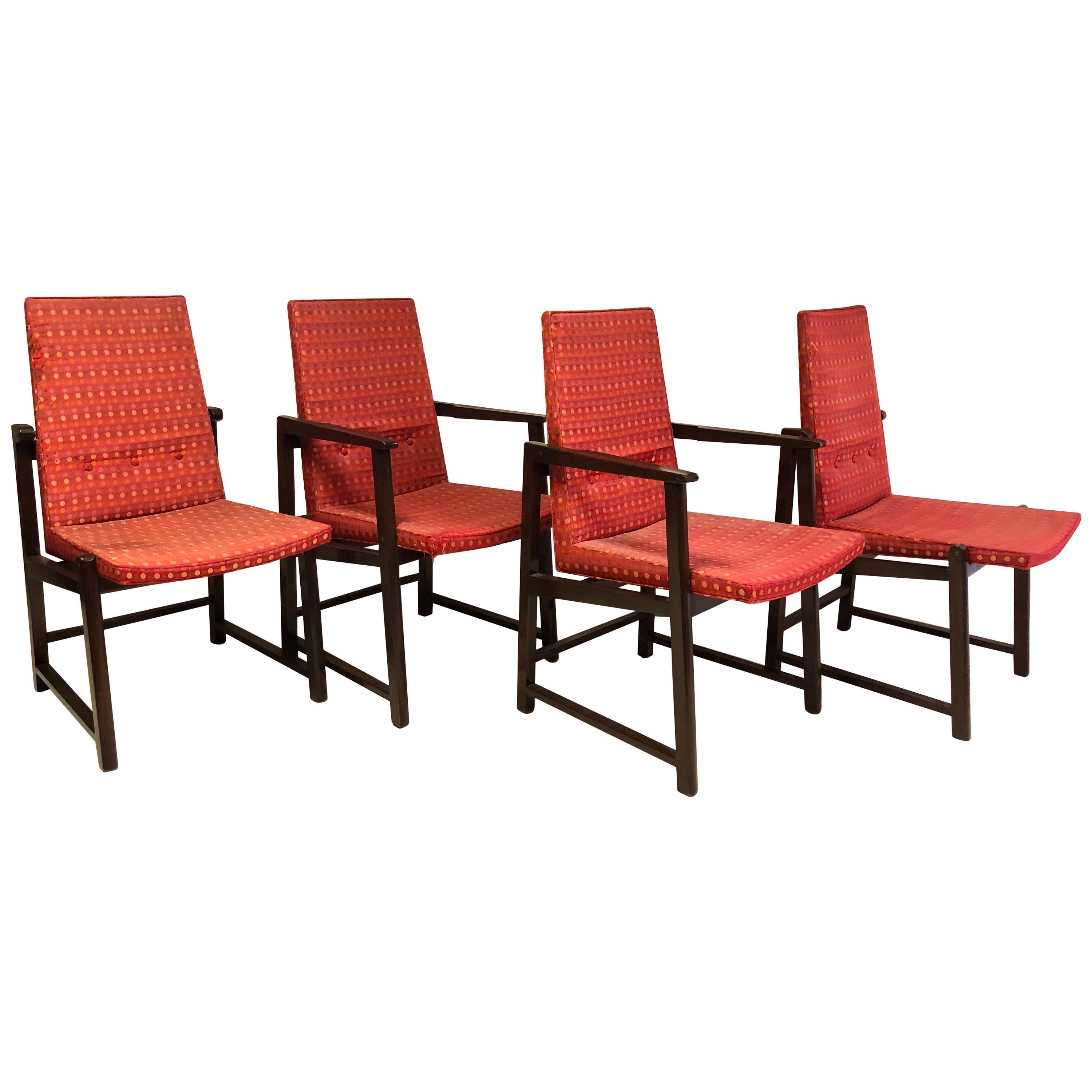 Edward Wormley for Dunbar dining chairs, models 6038 & 6037 in dark mahogany frames with original Jack Lenor Larsen fabric. Two arm and two side chairs, supported by brass spacers, with Dunbar label.