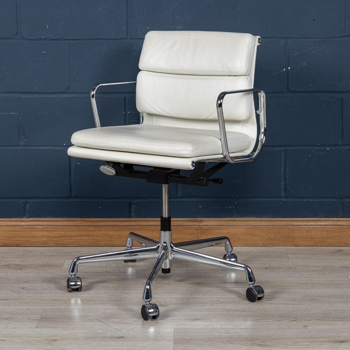 A stunning set of four Eames chairs by Vitra, of recent manufacture, in a delightful full white “snow“ leather upholstery. The white contrasts magnificently with the polished metal finish and stands on castors. Height adjustable and reclinable, the