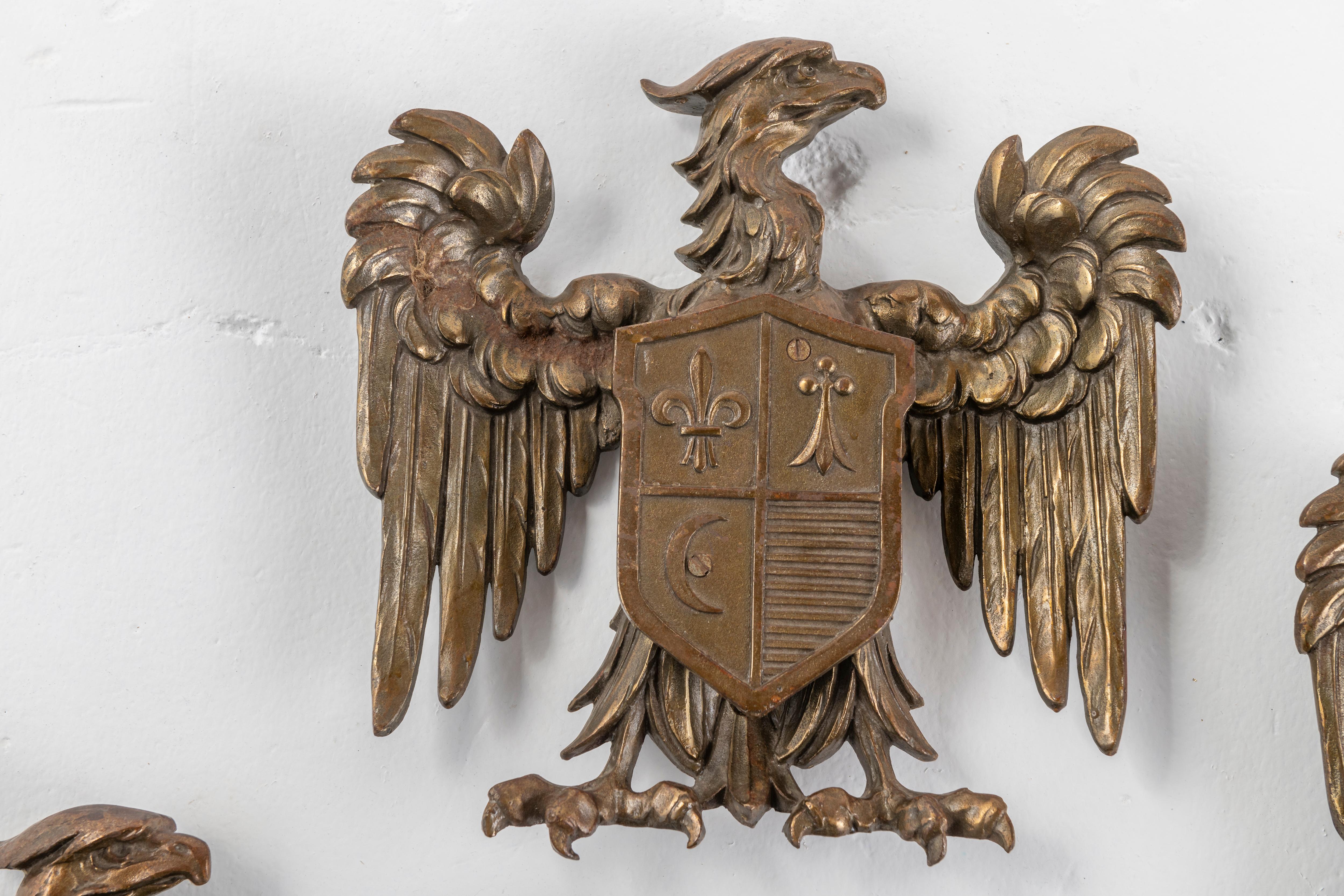 Set of Four Eagle Shield Crests in Bronze In Good Condition For Sale In San Francisco, CA
