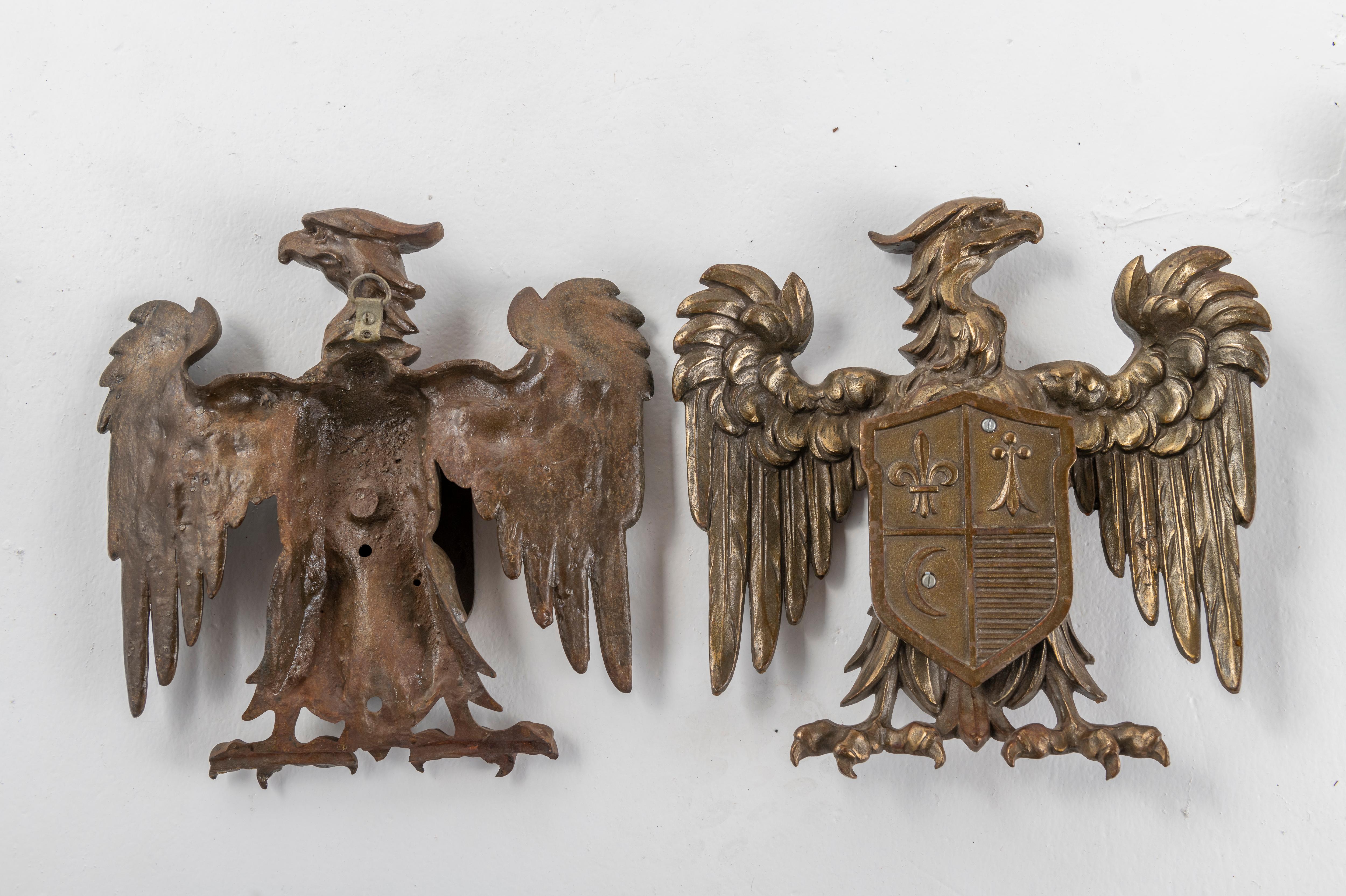 Mid-20th Century Set of Four Eagle Shield Crests in Bronze For Sale