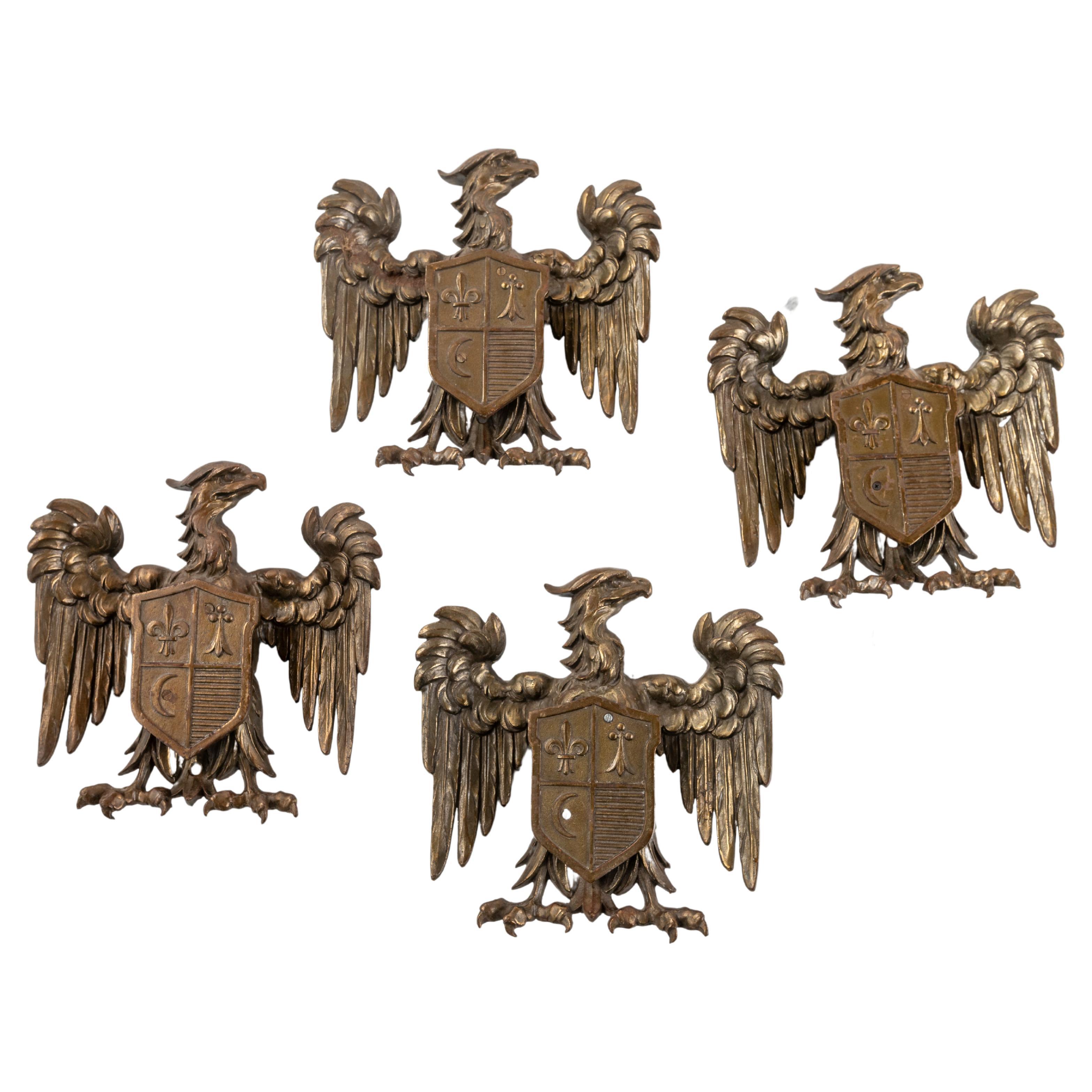 Set of Four Eagle Shield Crests in Bronze For Sale