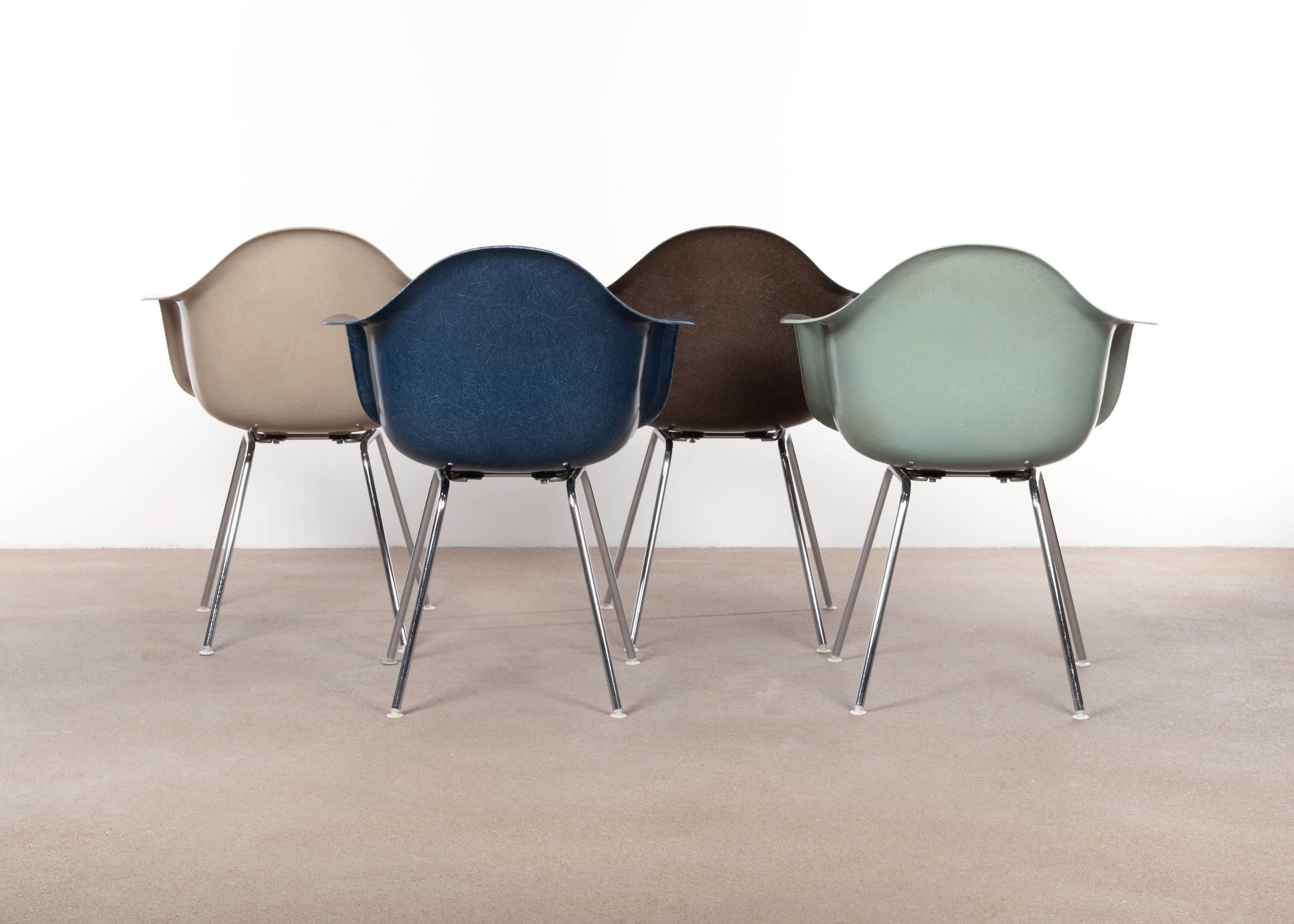Beautiful iconic DAX chairs in the colors: Sea foam green, greige, seal brown and navy blue. Shells are in very good or excellent condition with only slight traces of use. Replaced shock mounts which guarantee save usability for the next decades.