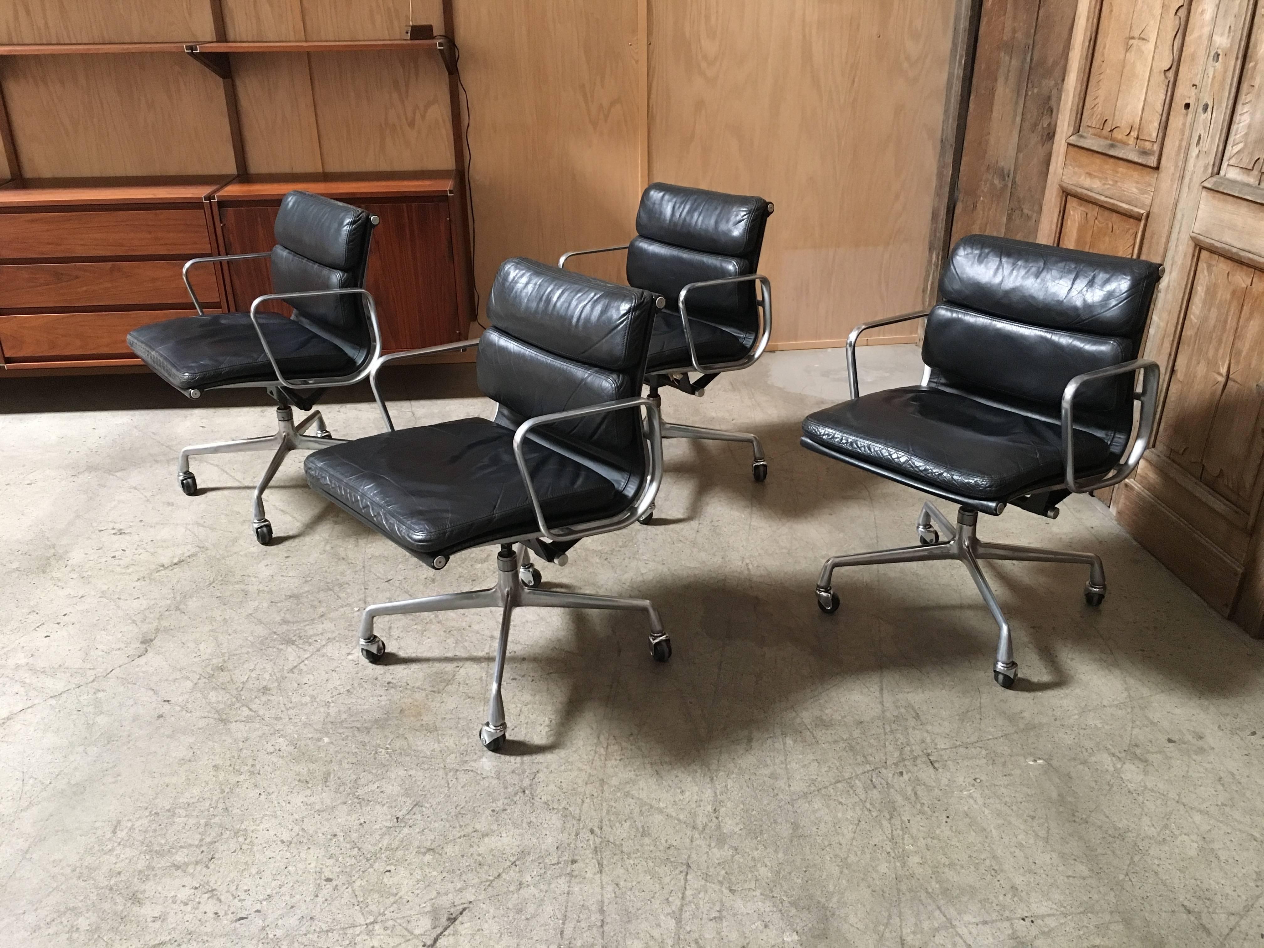 Mid-Century Modern Set of Four Eames for Herman Miller Black Soft Pad Management Chairs