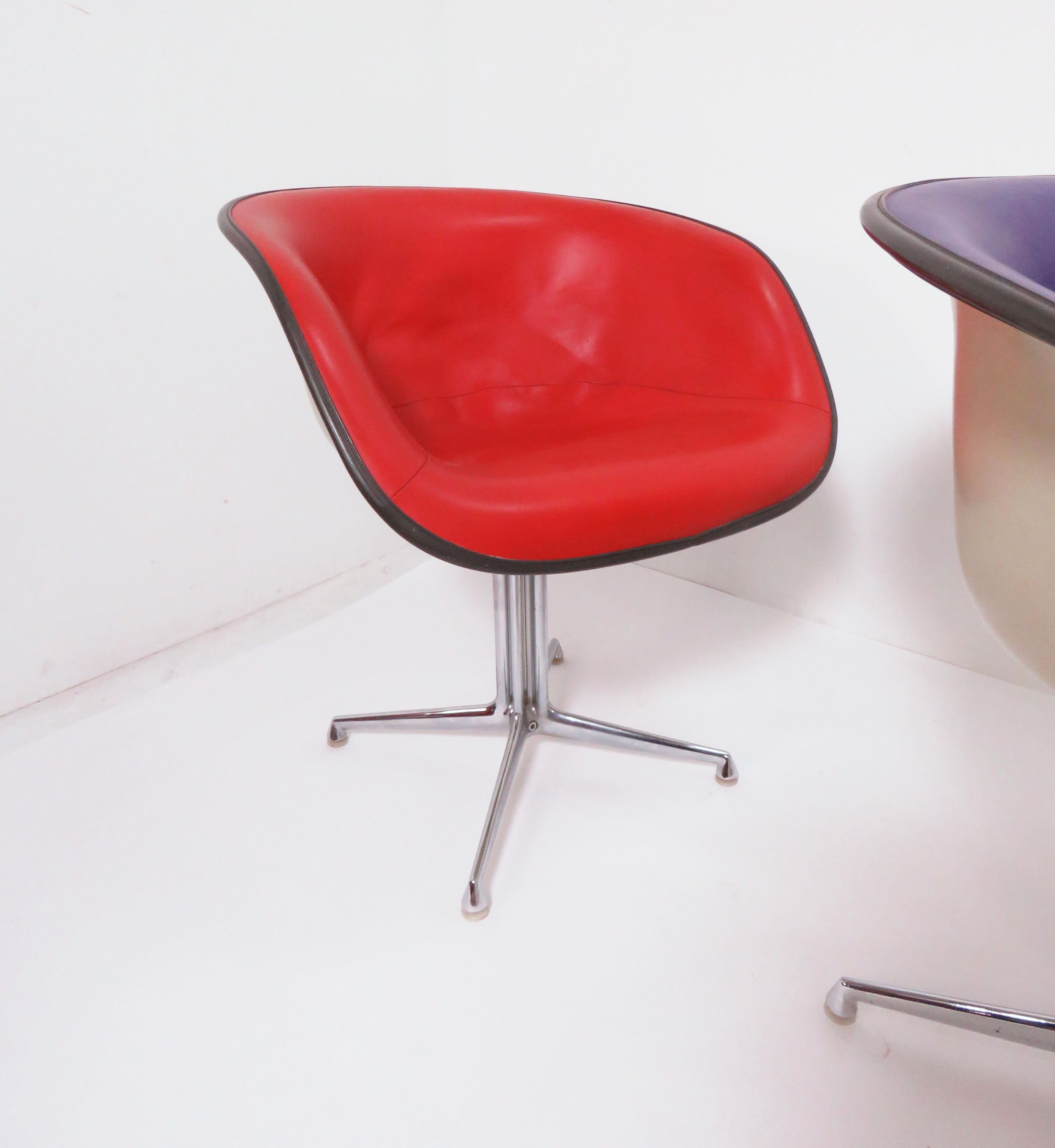 Set of four model 1730 Charles and Ray Eames chairs in original Alexander Girard naugahyde, low back shells on La Fonda bases. Commissioned in 1961 for Girard’s restaurant “La Fonda del Sol” at the Time Life building in Manhattan.