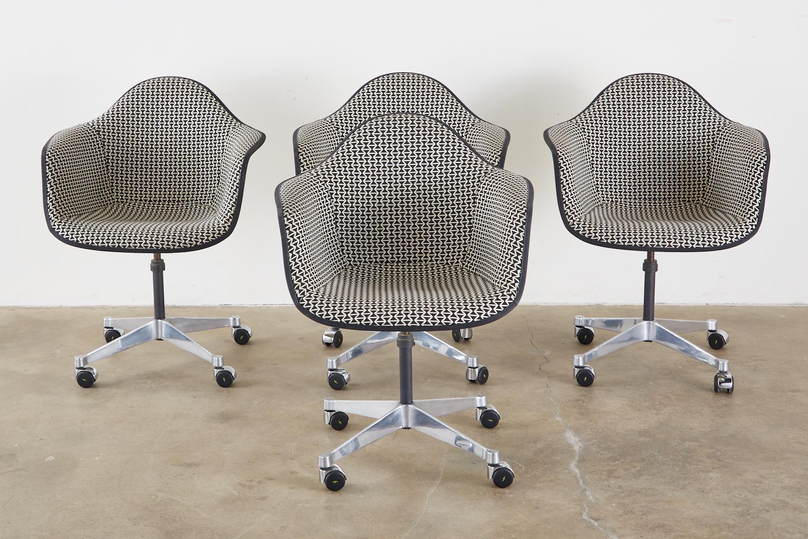 Polished Set of Four Eames for Herman Miller Swivel Shell Chairs  For Sale