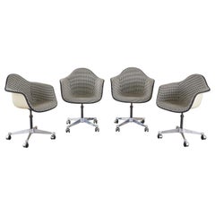 Vintage Set of Four Eames for Herman Miller Swivel Shell Chairs 