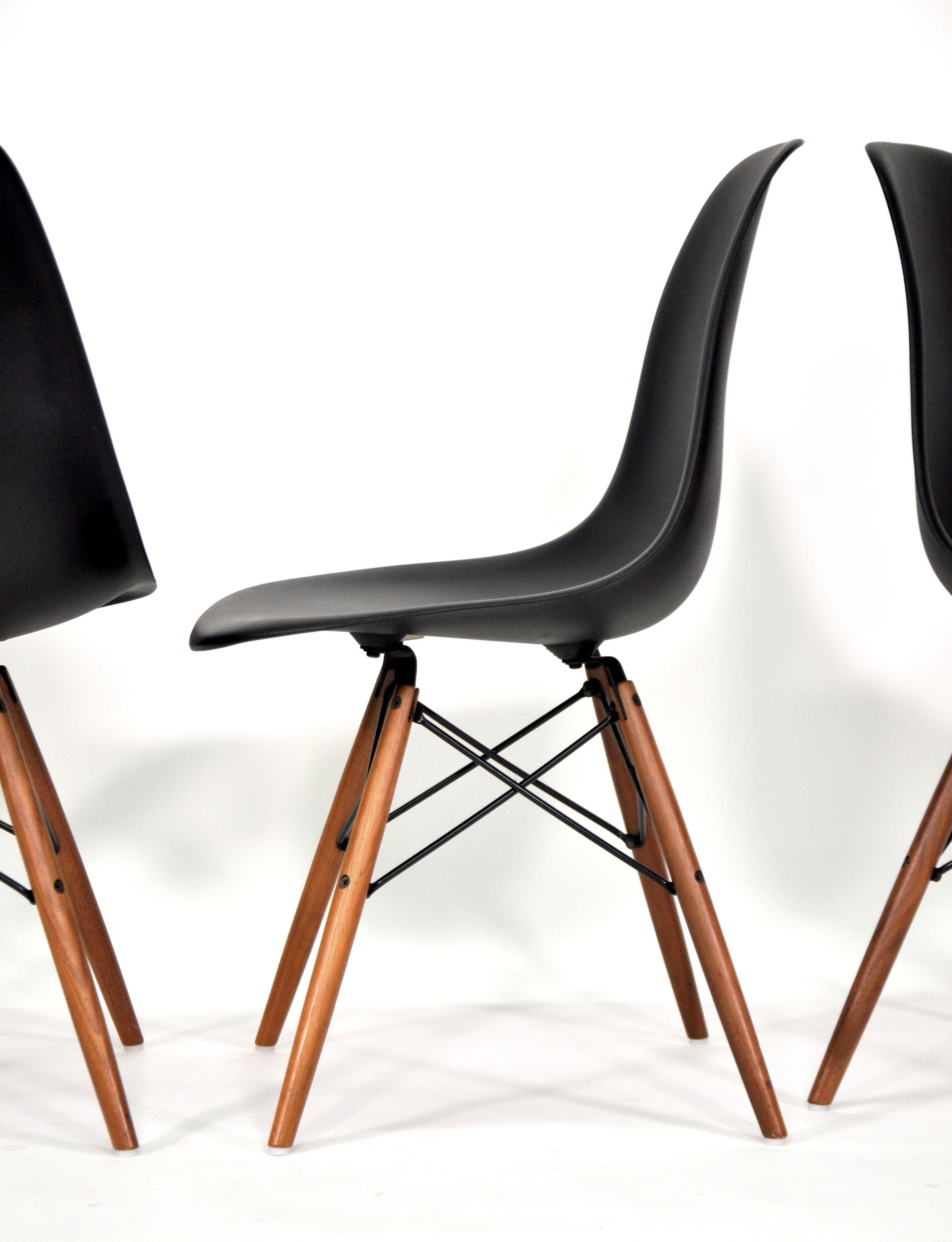 Contemporary Four Eames Herman Miller Black DSW Dining Chairs For Sale