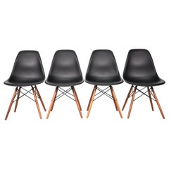 Four Eames Herman Miller Black DSW Dining Chairs