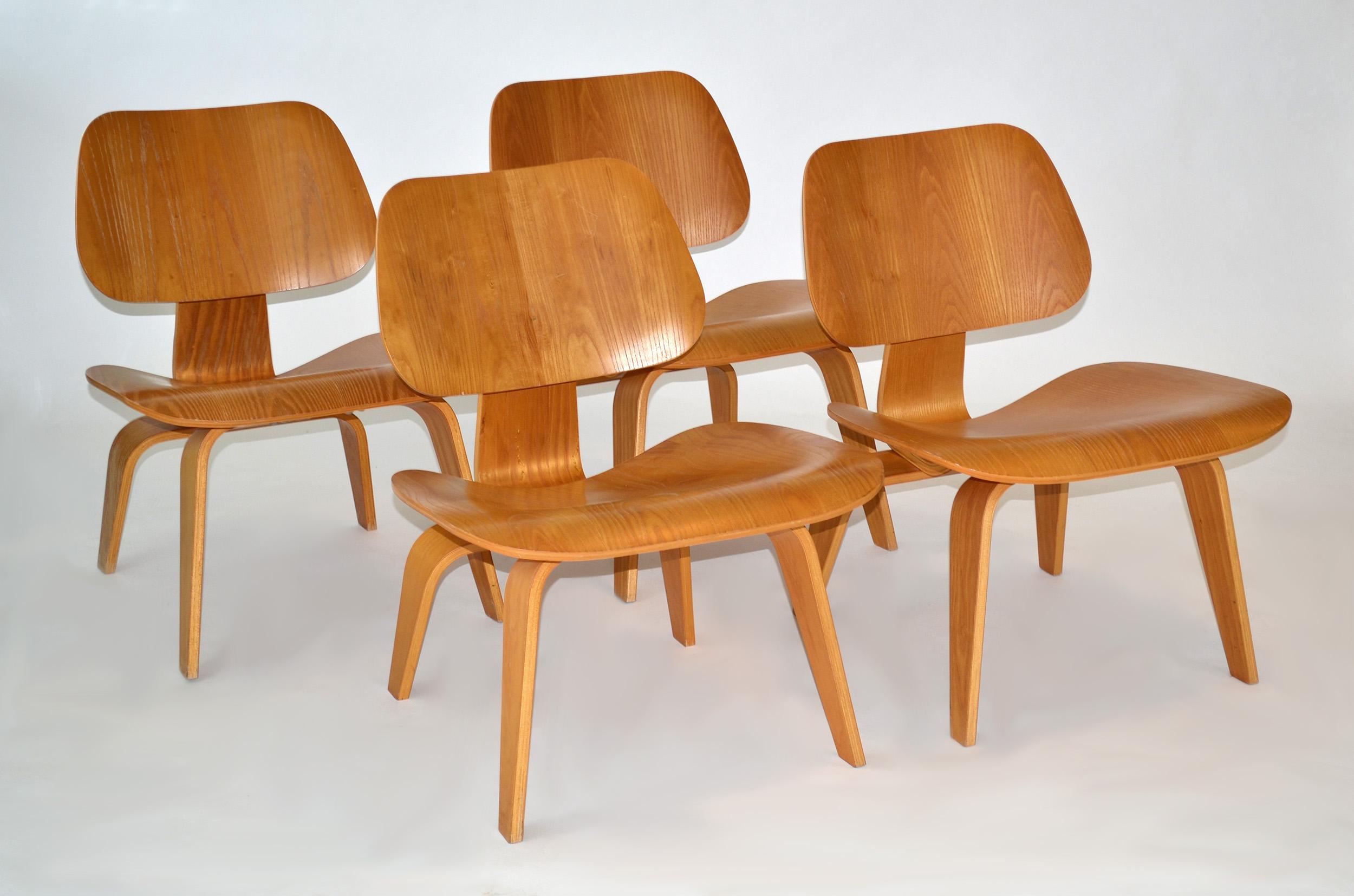 Set of Four Eames LCW plywood lounge chairs for Herman Miller c. 2002
Molded five-ply seat and backs with eight-ply legs and bracj brace, Rubber shock mounts. Signed. Early 21st century production. Price is for set of four.