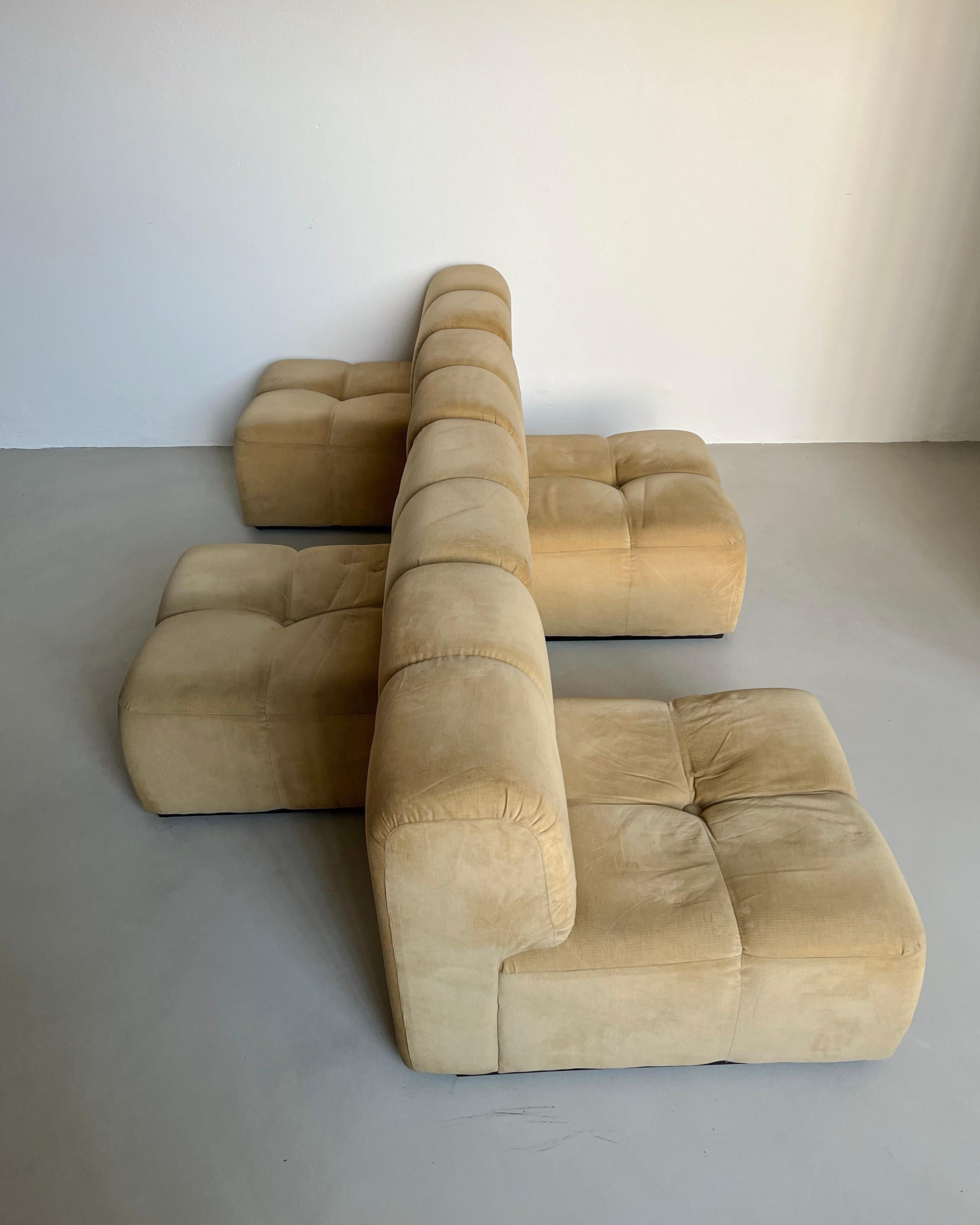 Offered for sale is a set of four modular lounge chairs, which can be placed side by side to build a four seater sofa and also placed in several different configurations. Made in Italy, they can be dated to the second half of the 1970s: the golden
