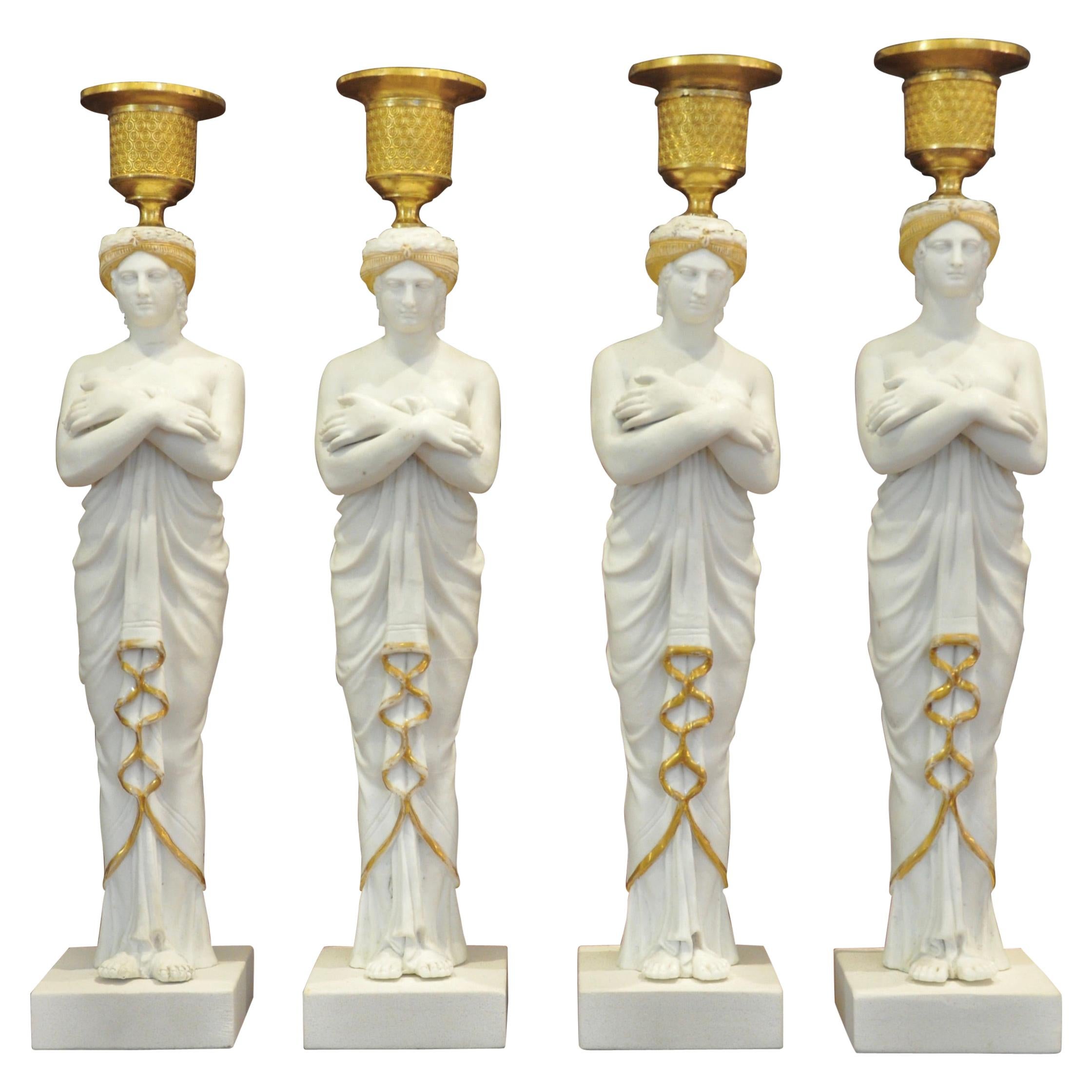 Set of Four Early 19th Century Biscuit Caryatid Figures as Candlesticks