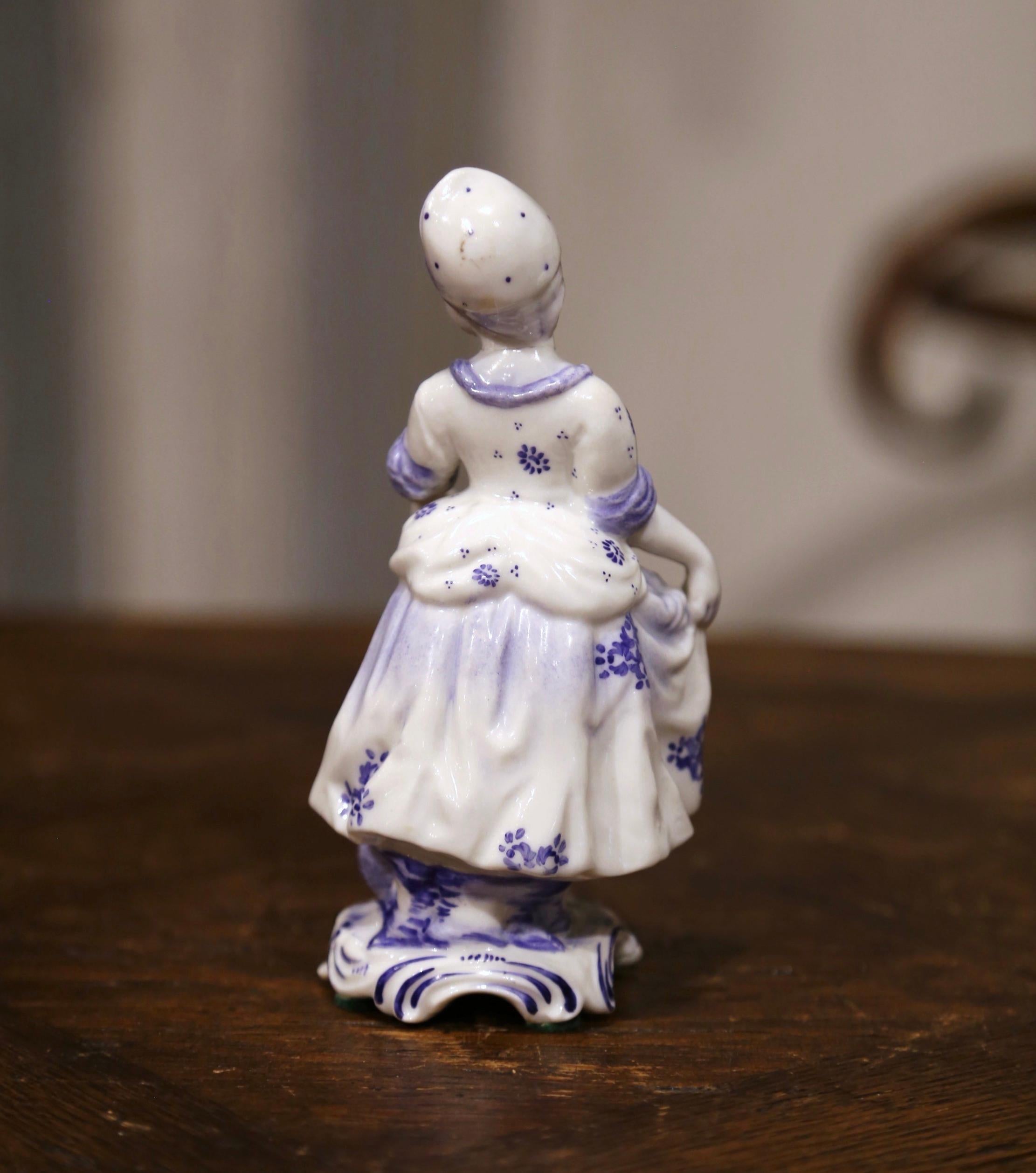 Set of Four Early 20th Century Dutch Hand Painted Porcelain Delft Figurines For Sale 4
