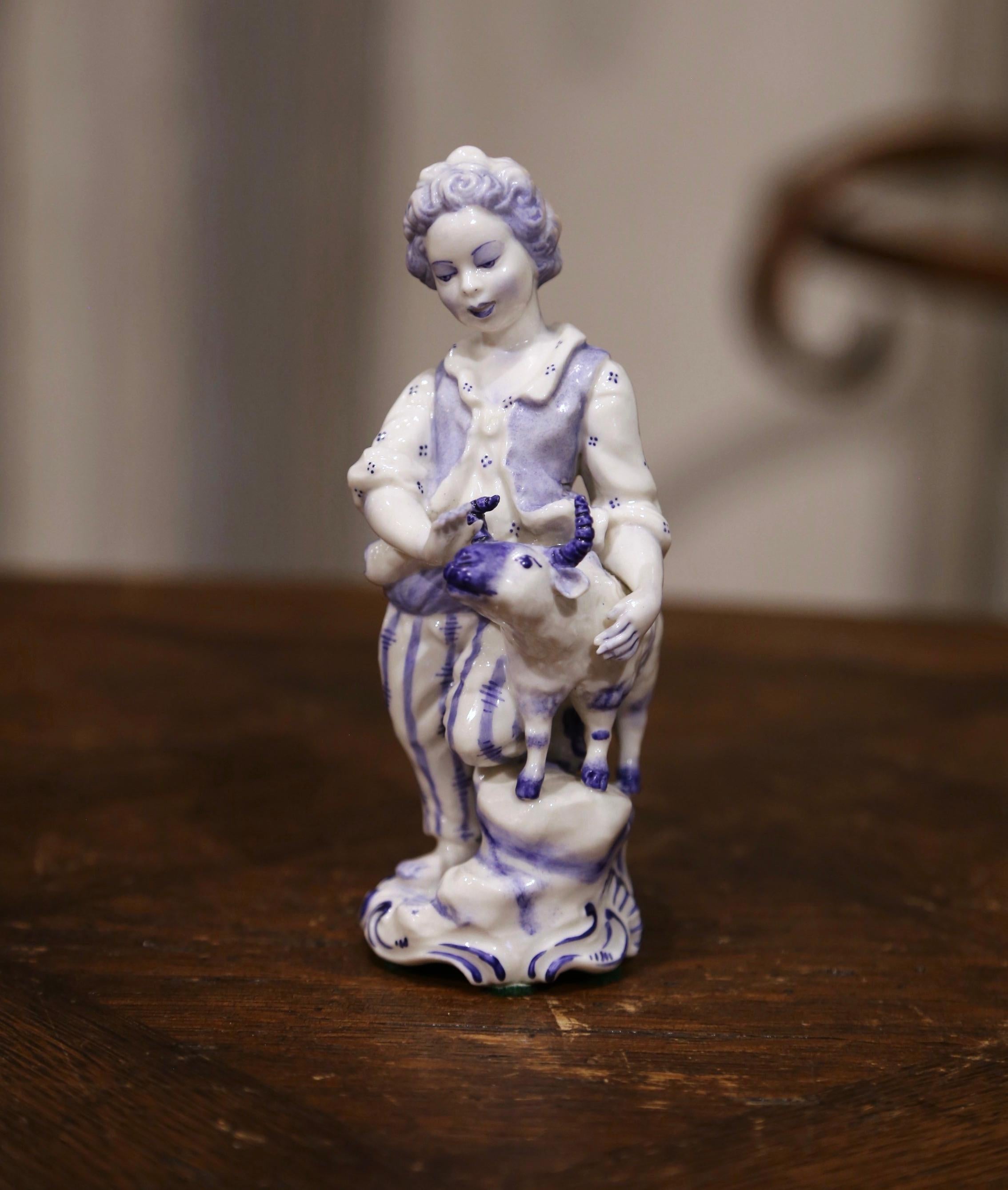 Set of Four Early 20th Century Dutch Hand Painted Porcelain Delft Figurines For Sale 5
