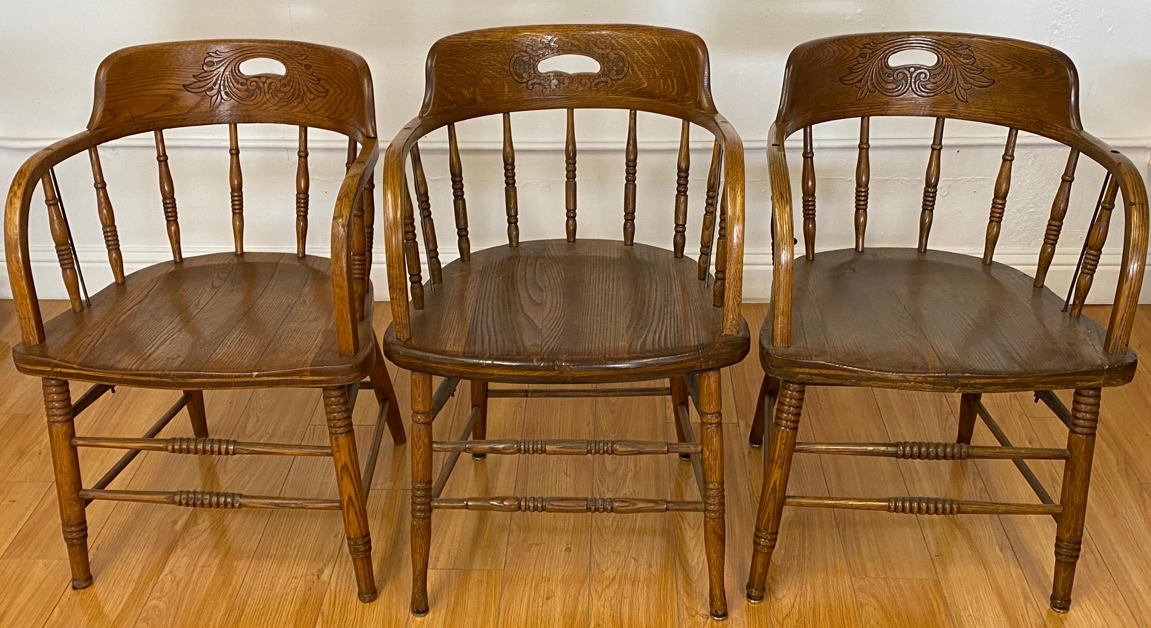American Set of Four Early 20th Century Mismatched Barrel Back Oak Pub Chairs