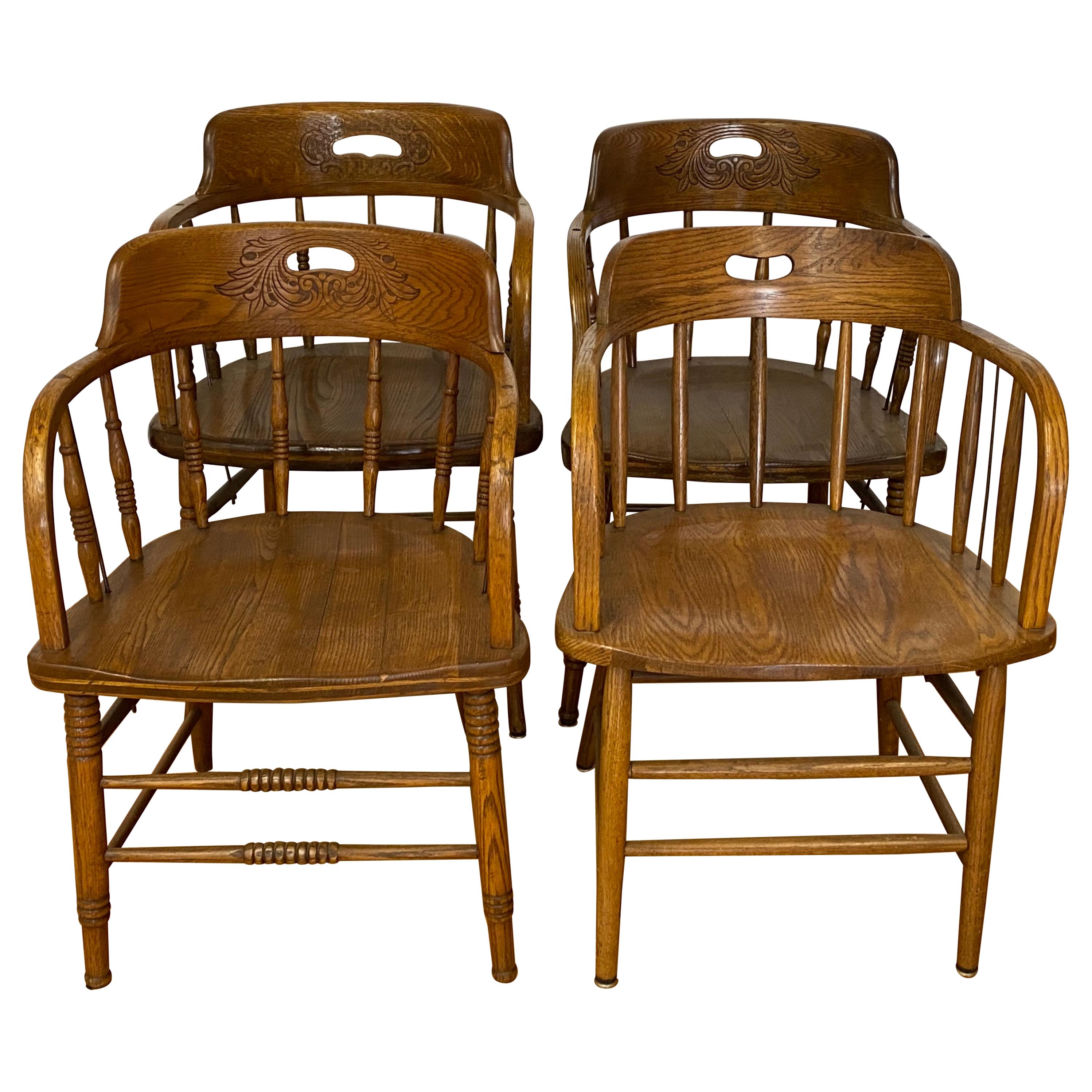 Set of Four Early 20th Century Mismatched Barrel Back Oak Pub Chairs