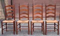 Set of Four Early American Style Mahogany Rush Seat Ladder Back Side Chairs