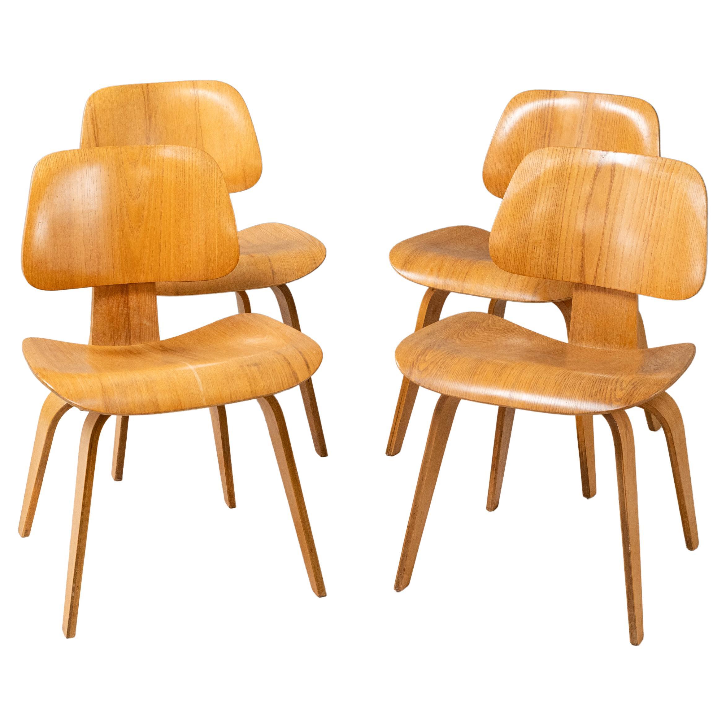 Set of Four Early Eames Dining Chairs
